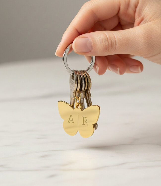 Vlinder Sleutelhanger een betekenisvol accessoire met persoonlijke gravure
