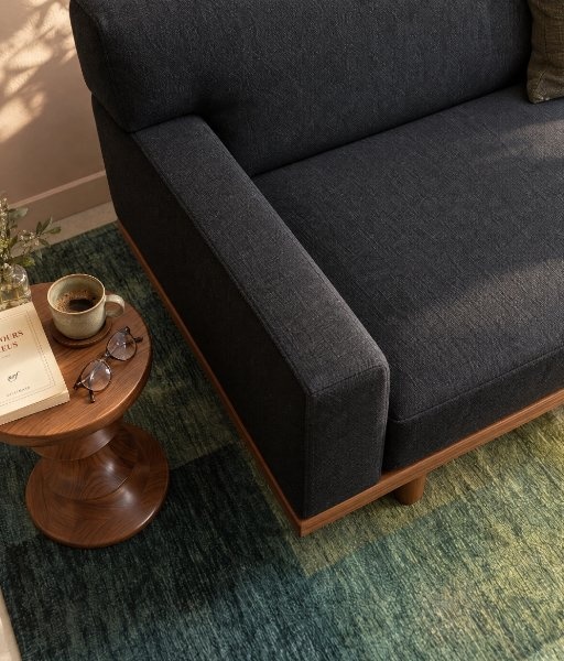 Rug extending beyond the sofa