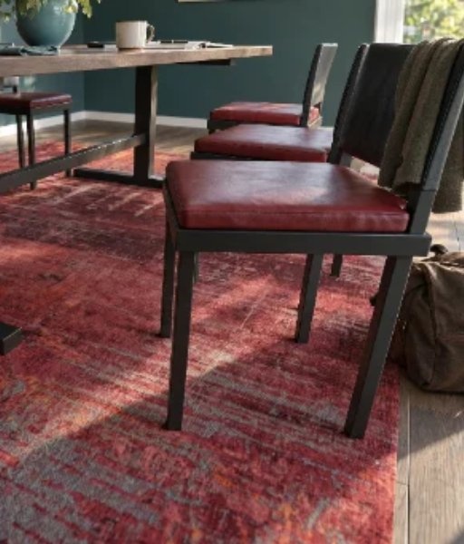 Chair pulled out, still on the rug