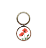 Llavero de metal color plata, amapolas