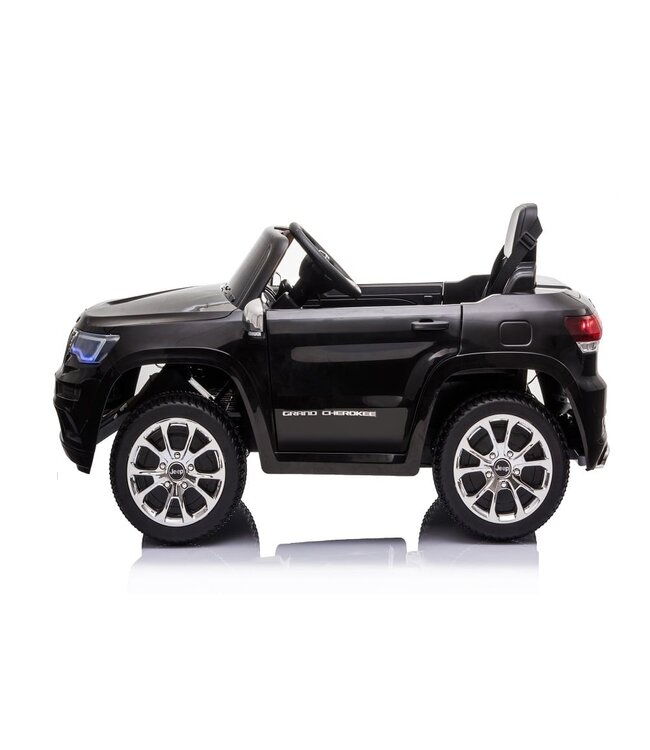 Jeep Grand Cherokee, 12 volt electric children's car, leather seat and more!