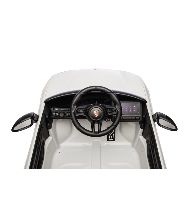 Porsche Macan Turbo electric ride-on car with a lithium battery, music module, rubber tires, and more.
