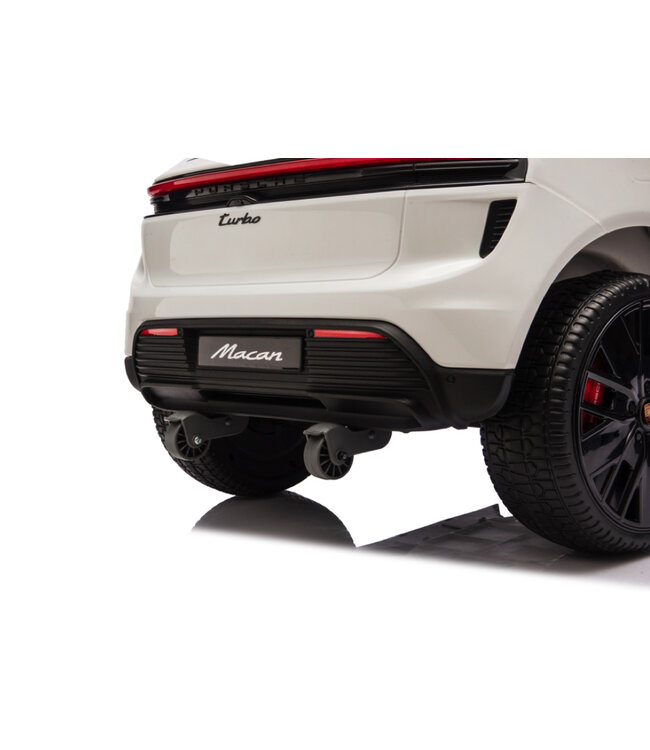 Porsche Macan Turbo electric ride-on car with a lithium battery, music module, rubber tires, and more.