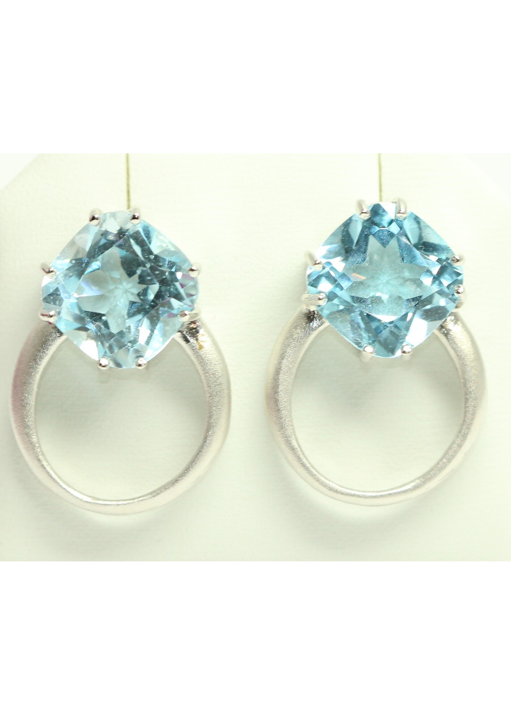925 rhodium plated silver earrings set with natural Blue Topaz
