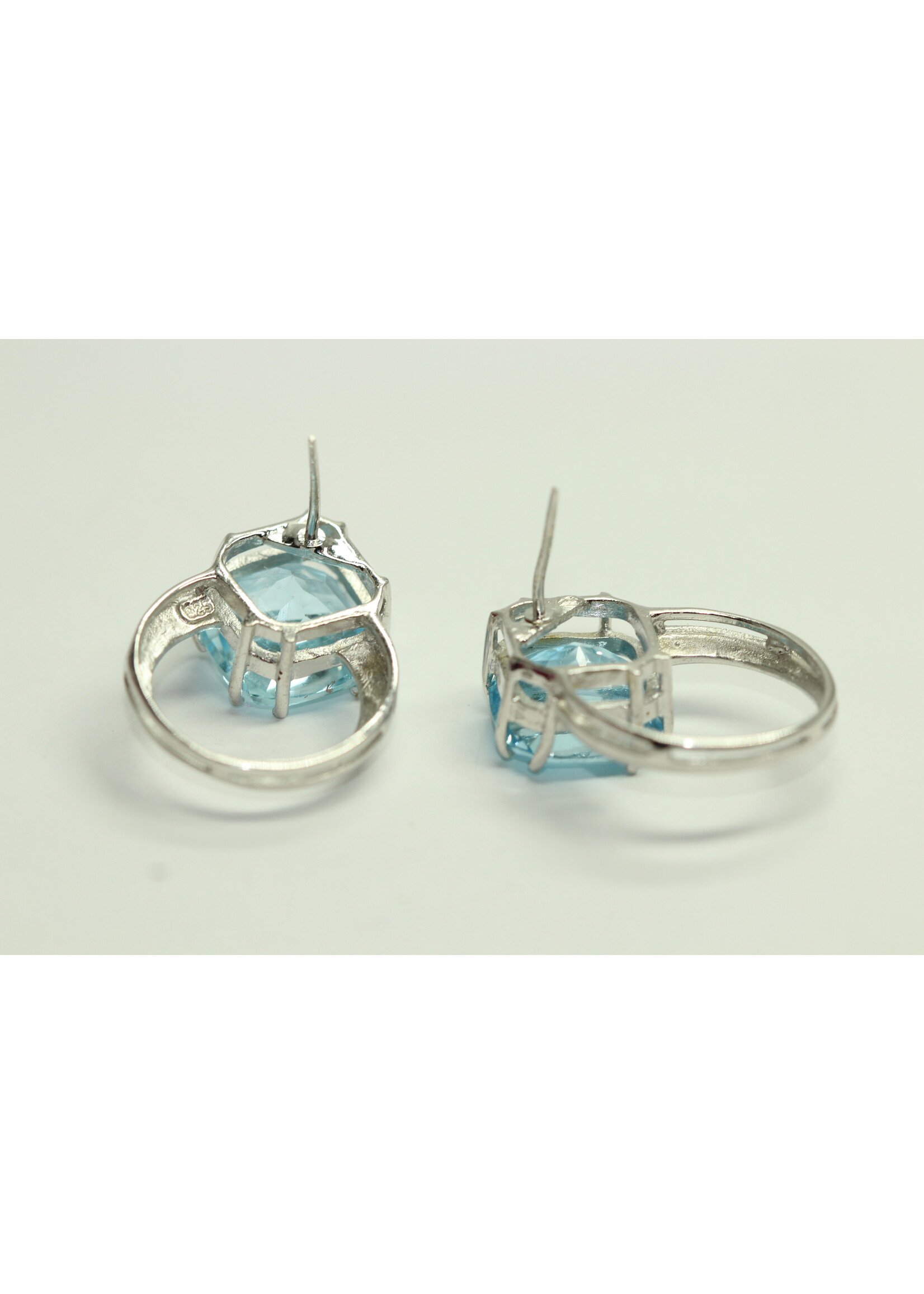 925 rhodium plated silver earrings set with natural Blue Topaz