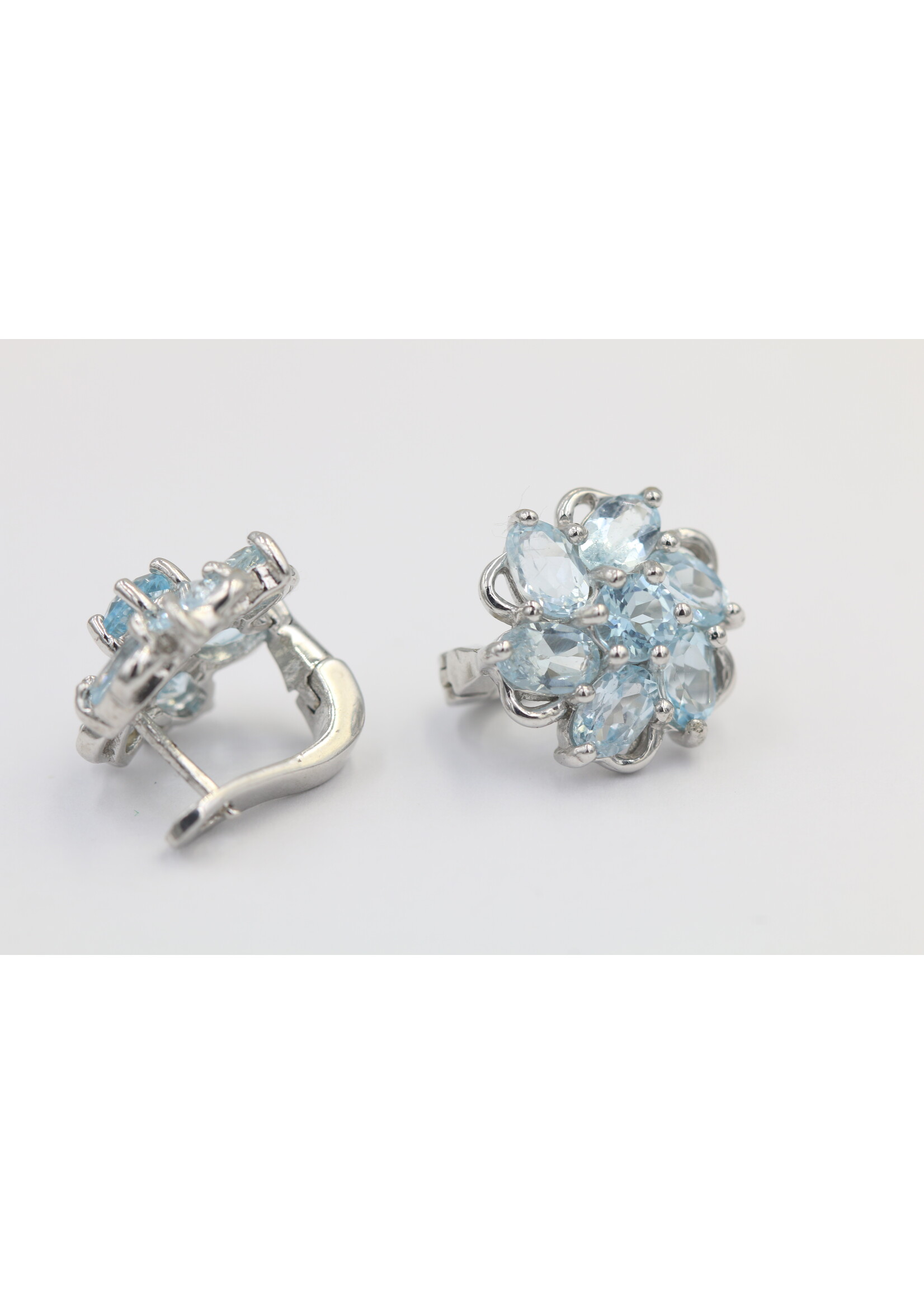 925 rhodium plated silver earrings set with natural Blue Topaz