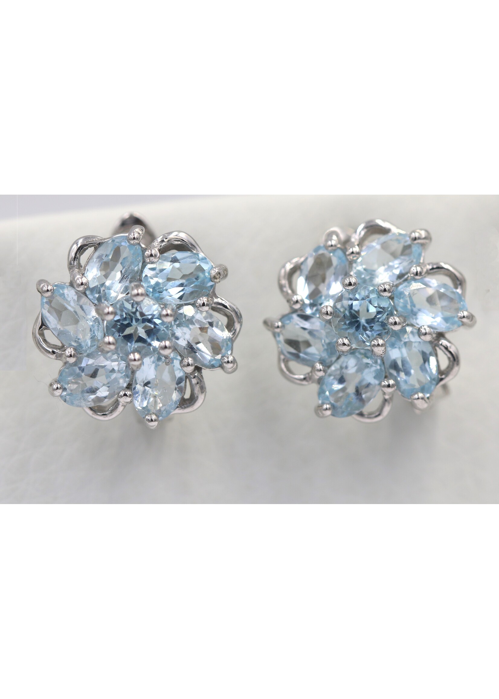 925 rhodium plated silver earrings set with natural Blue Topaz