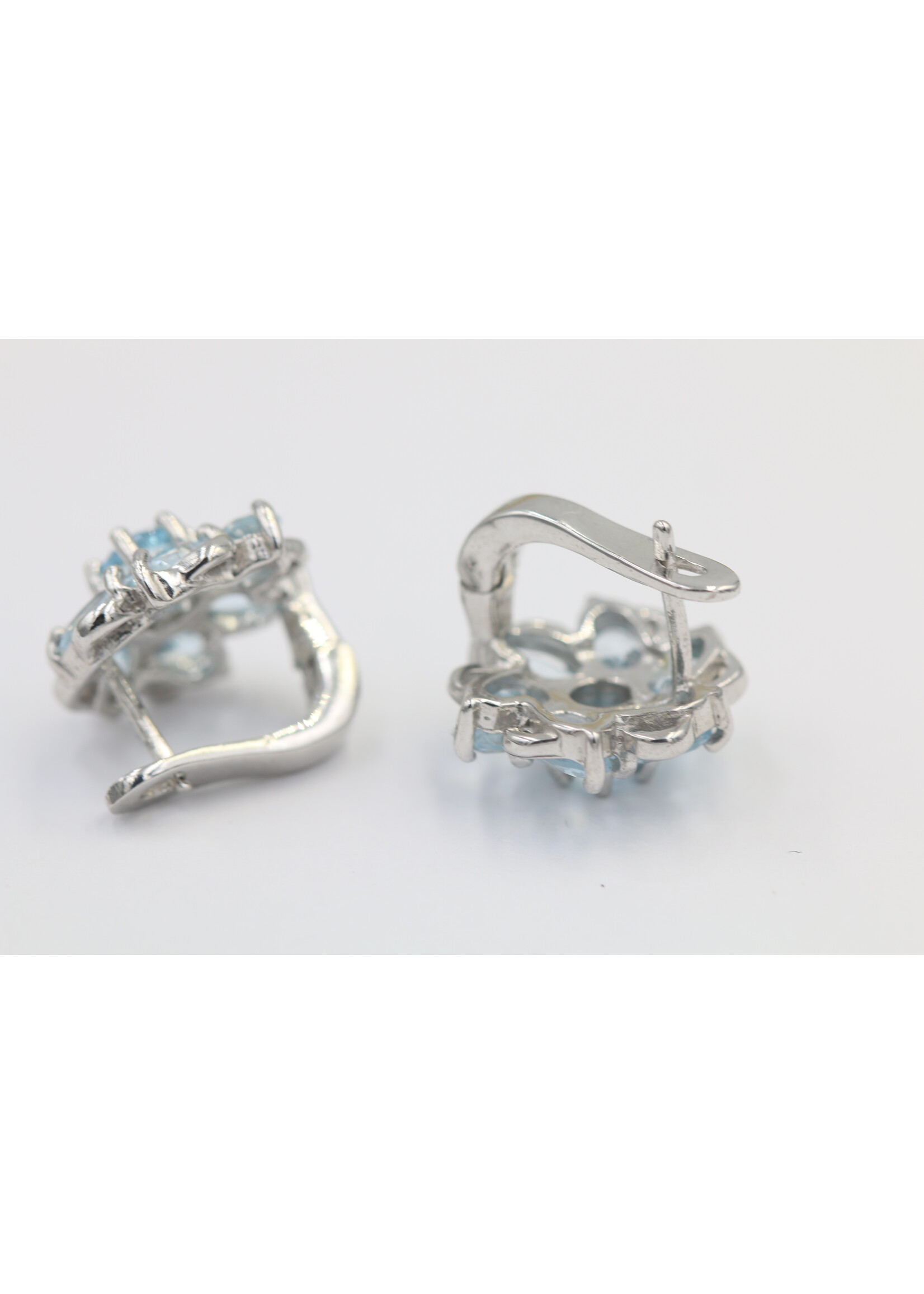 925 rhodium plated silver earrings set with natural Blue Topaz