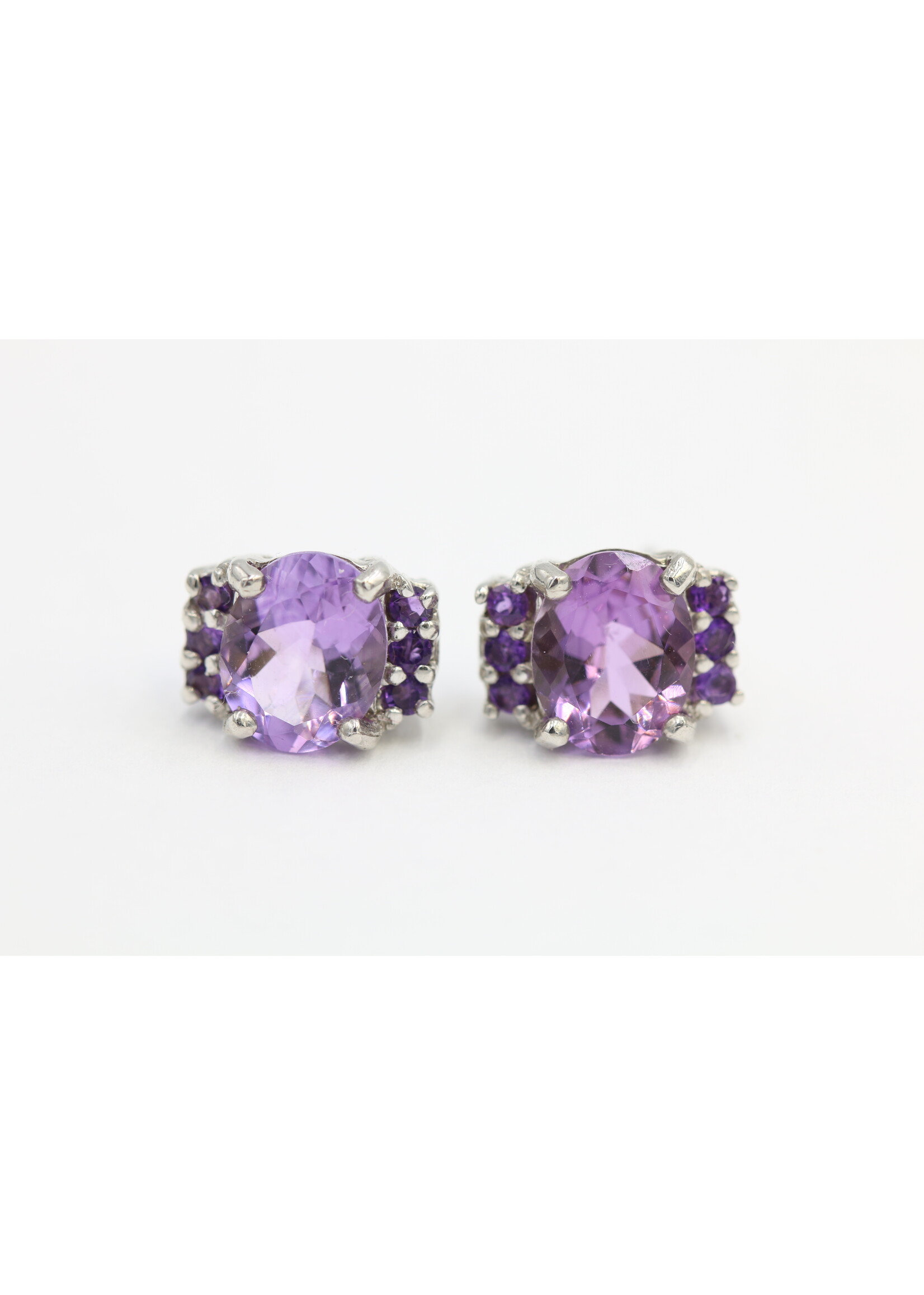 925 rhodium plated silver earrings set with natural amethysts