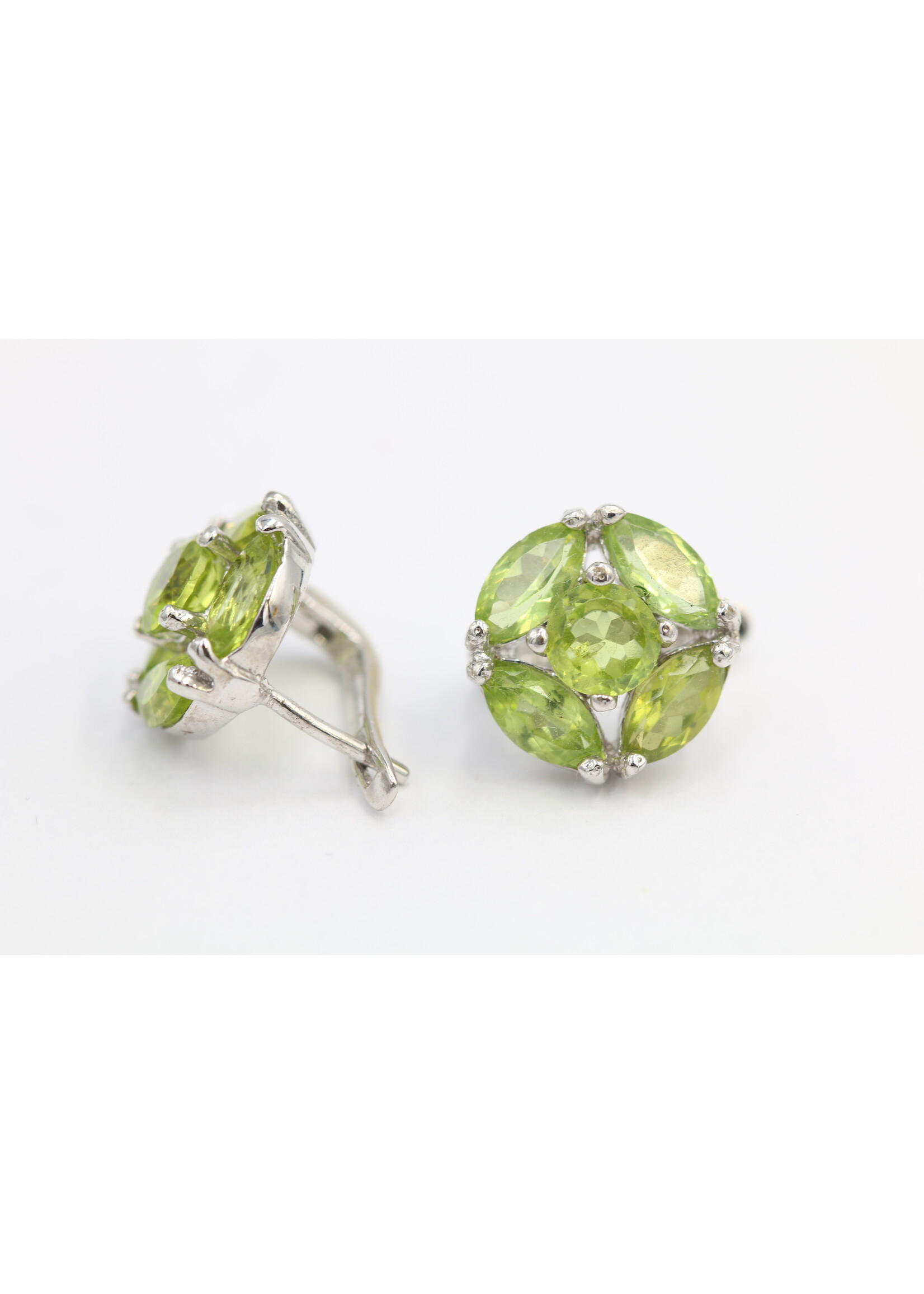 925 rhodium plated silver earrings set with natural peridots