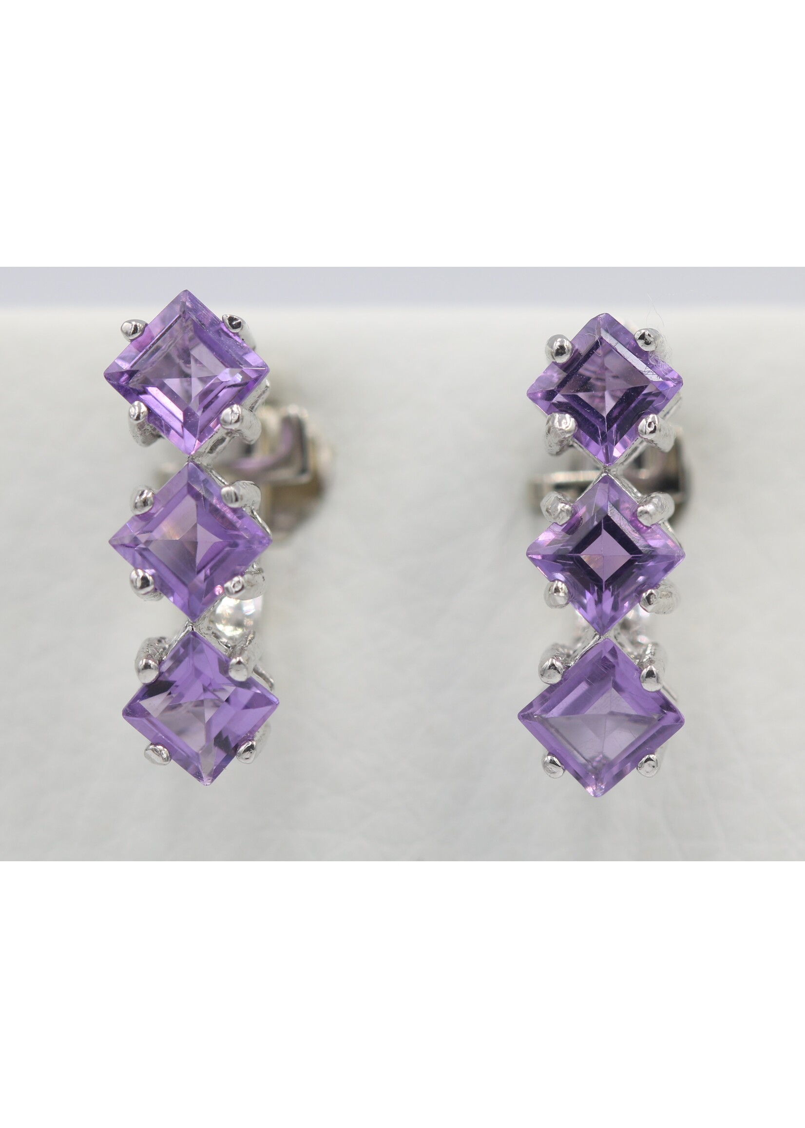 925 rhodium plated silver earrings set with natural amethysts
