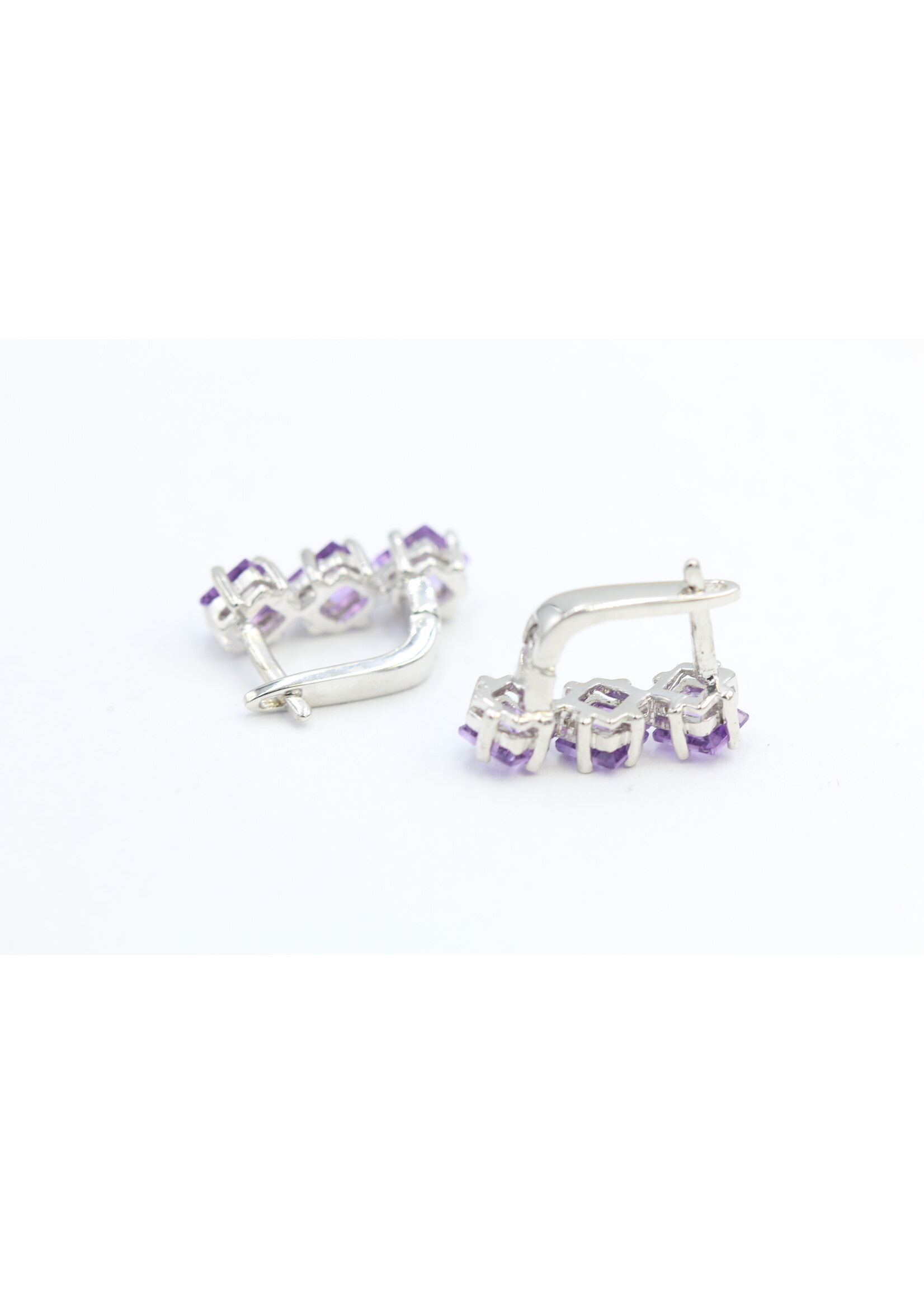 925 rhodium plated silver earrings set with natural amethysts