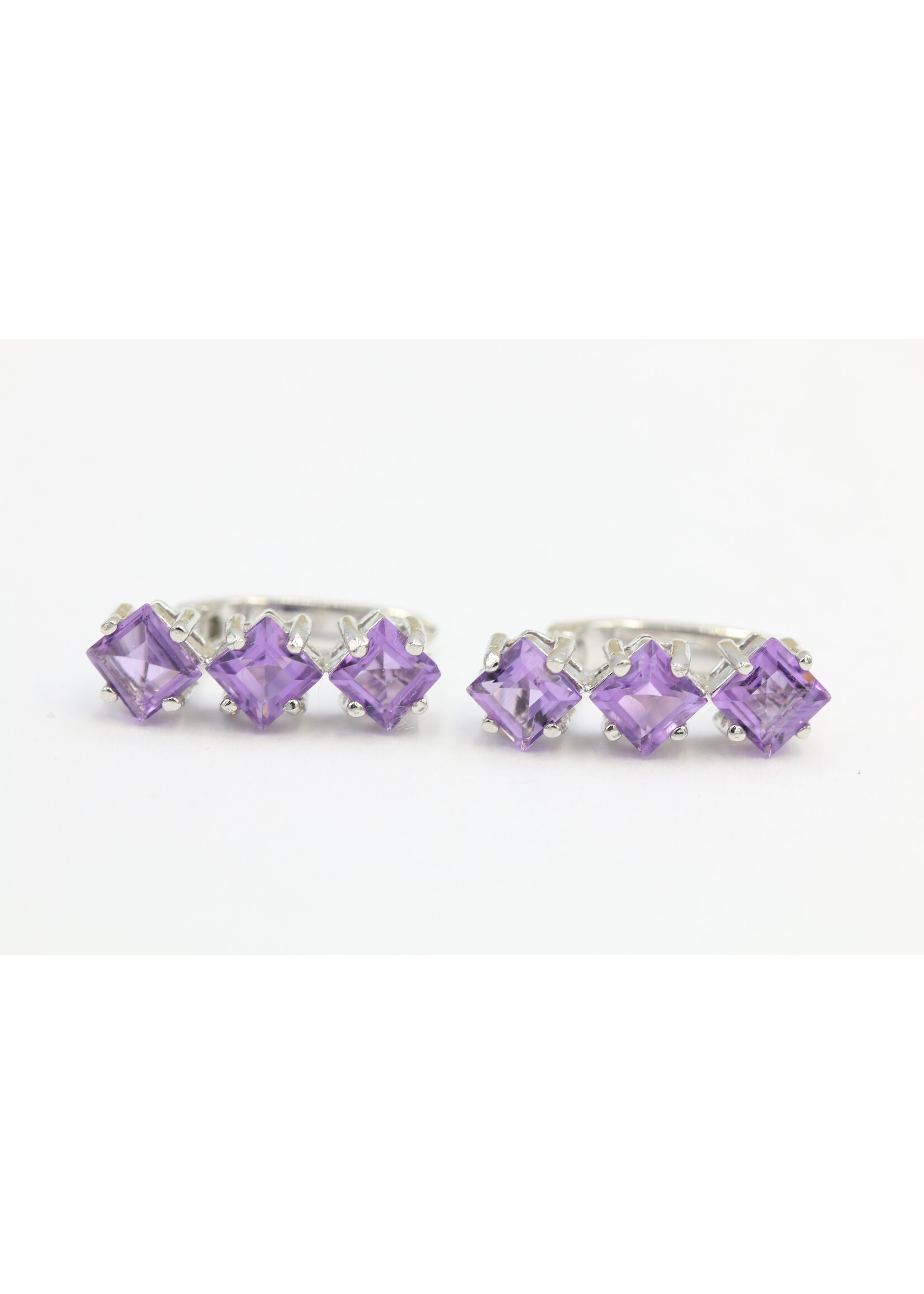 925 rhodium plated silver earrings set with natural amethysts