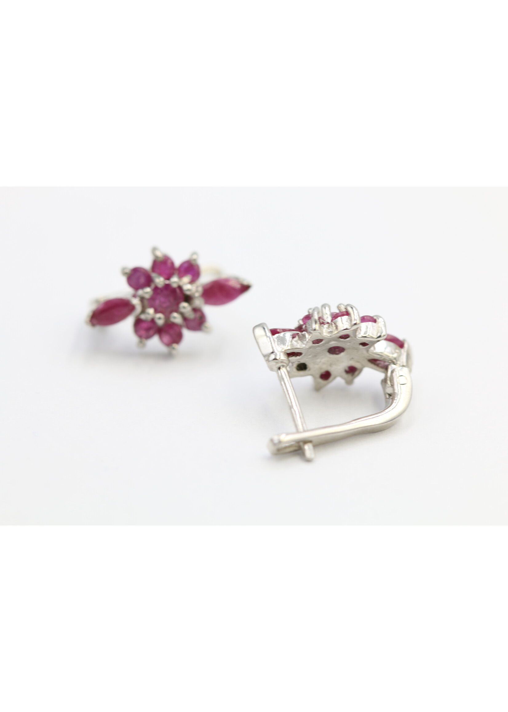 925 rhodium plated silver earrings set with natural rubies