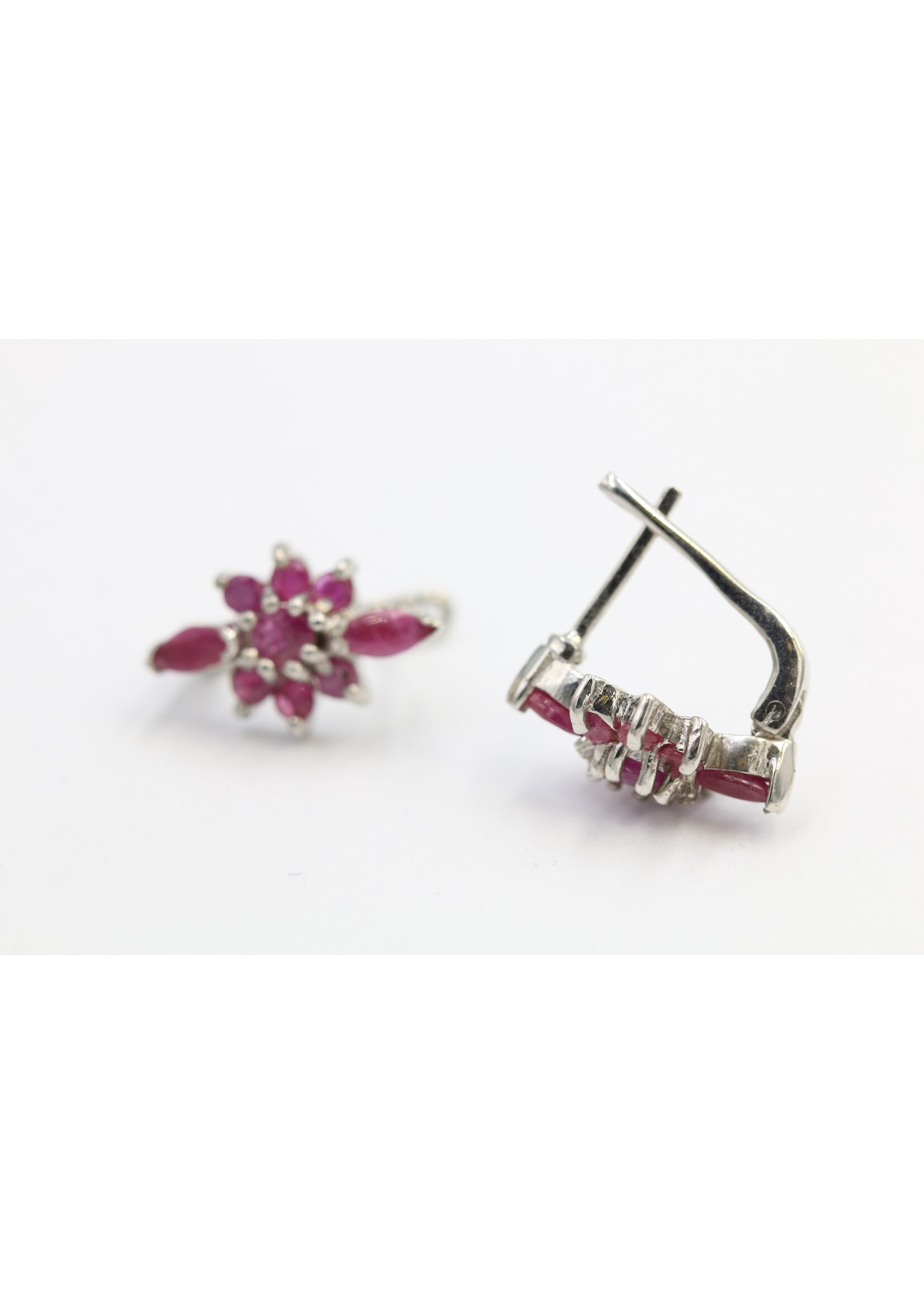 925 rhodium plated silver earrings set with natural rubies