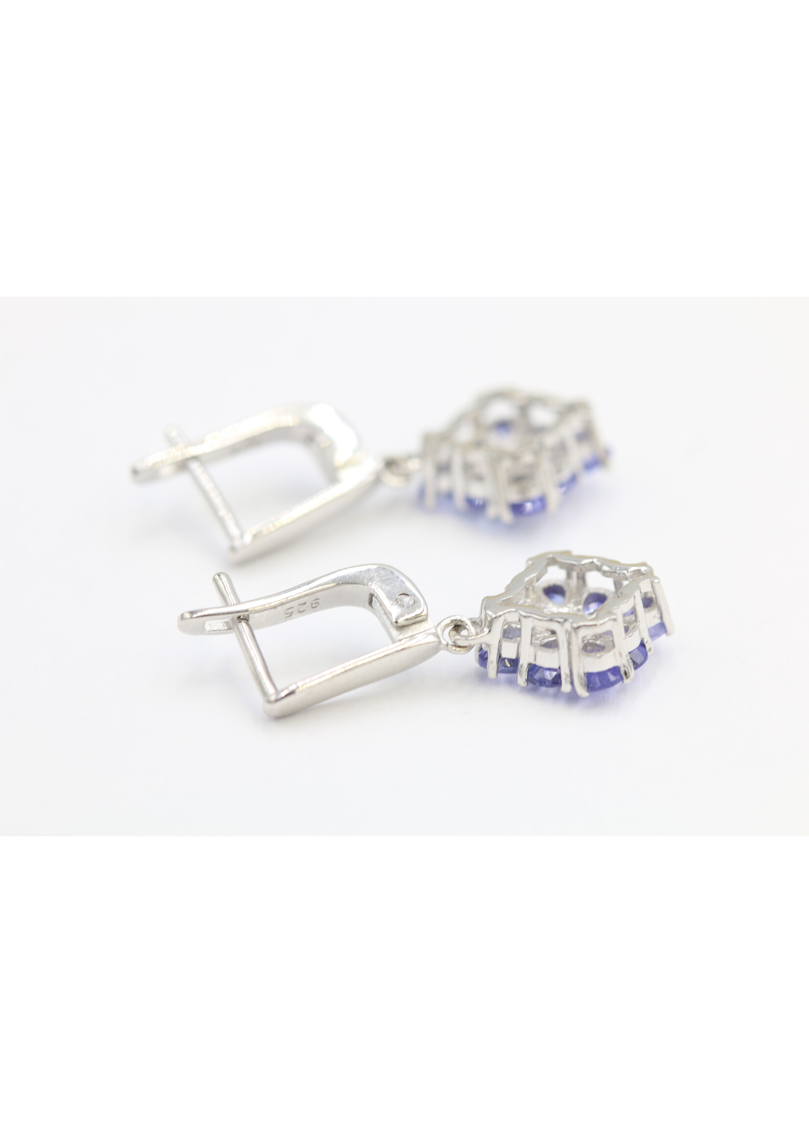 925 rhodium plated silver earrings set with natural tanzanites