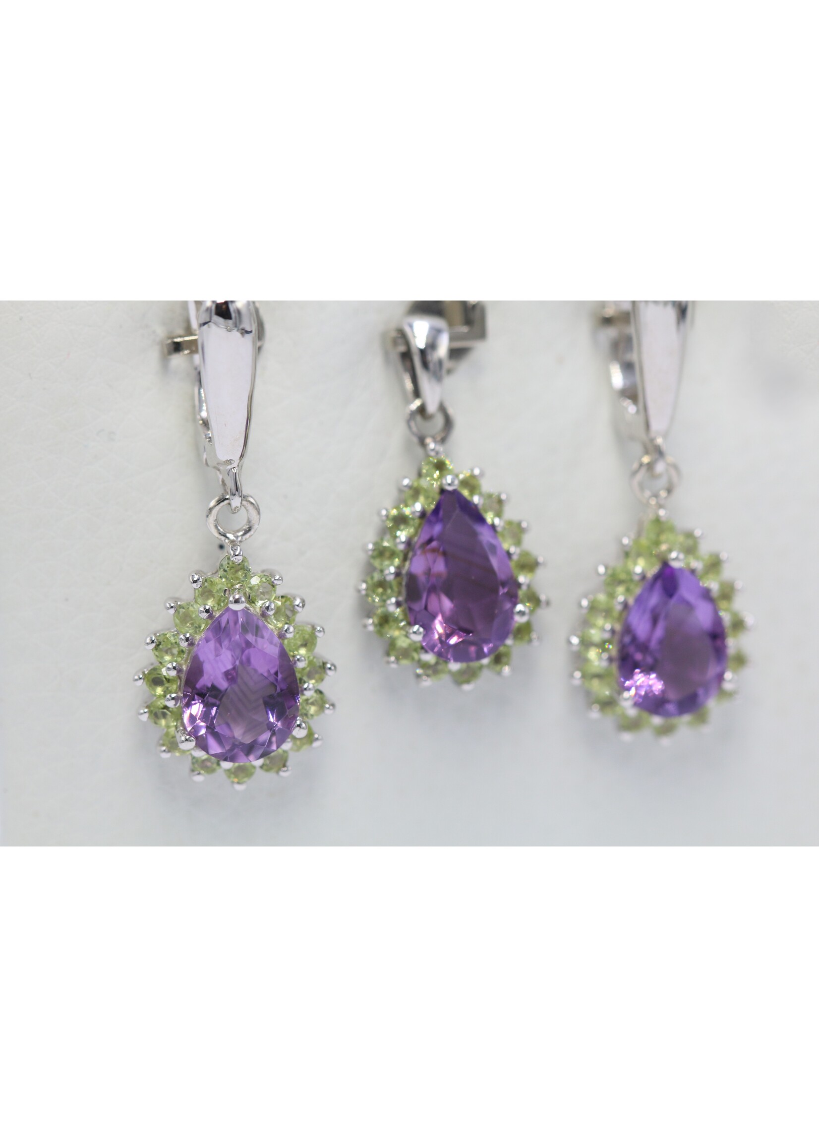 925 rhodium plated silver set with natural Peridot and Amethysts