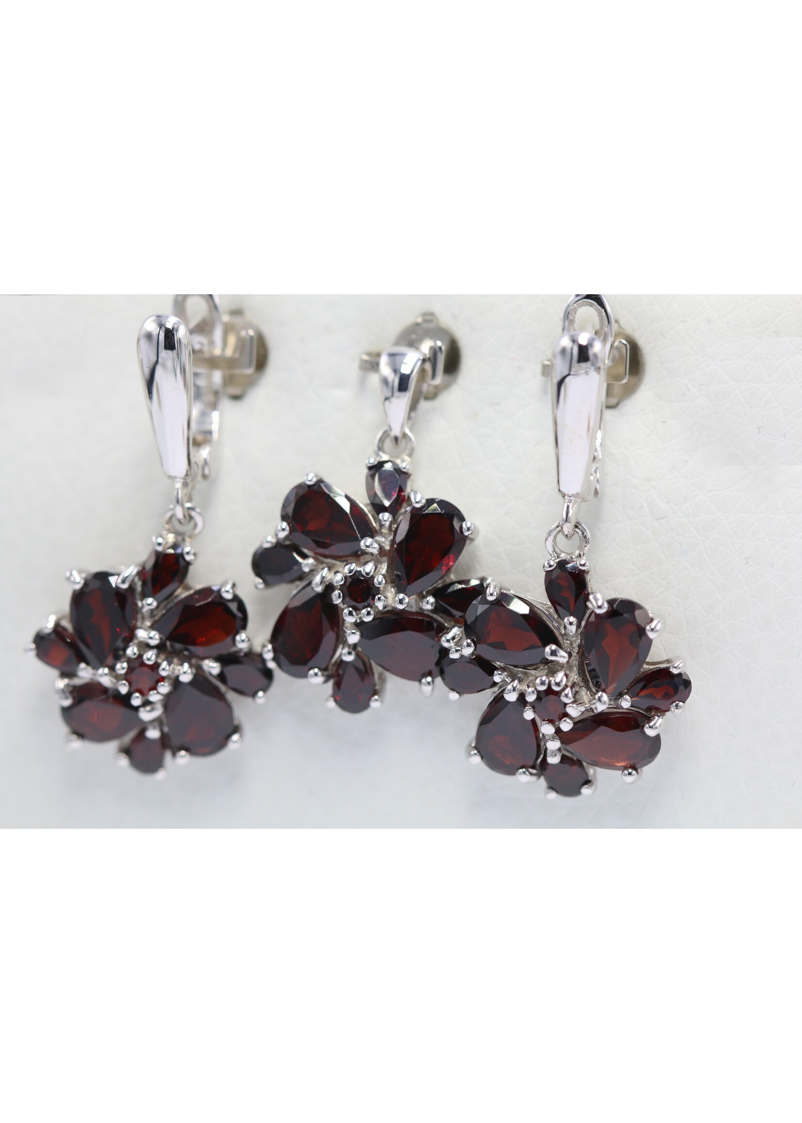 925 rhodium plated silver set with natural garnets