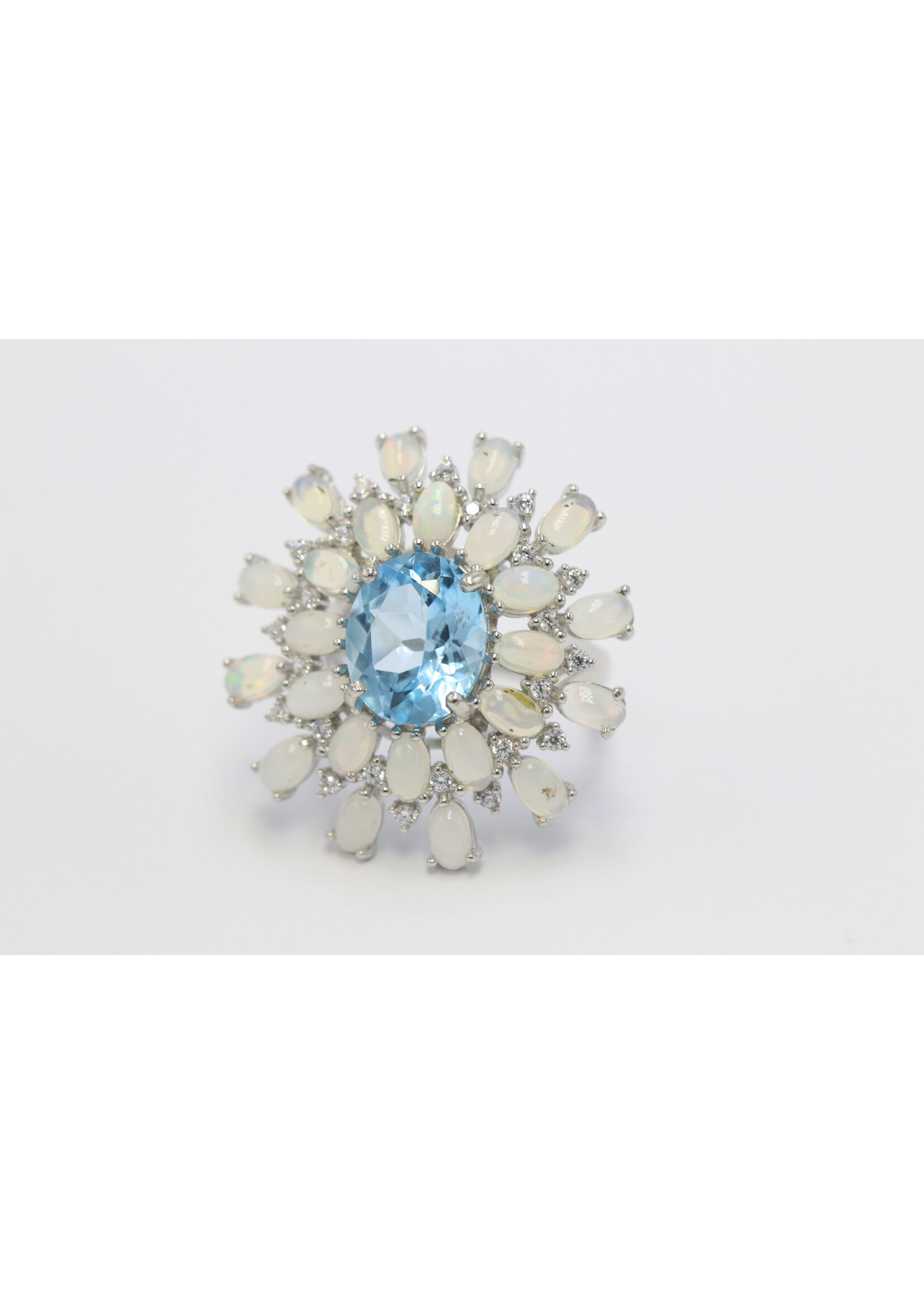 Bague en argent 925 rhodié sertie de Topazes et Opales naturelles