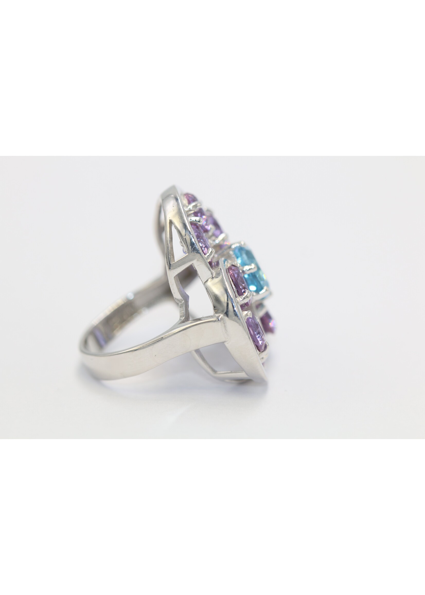 925 rhodium plated silver ring set with natural Blue Topaz and Amethysts
