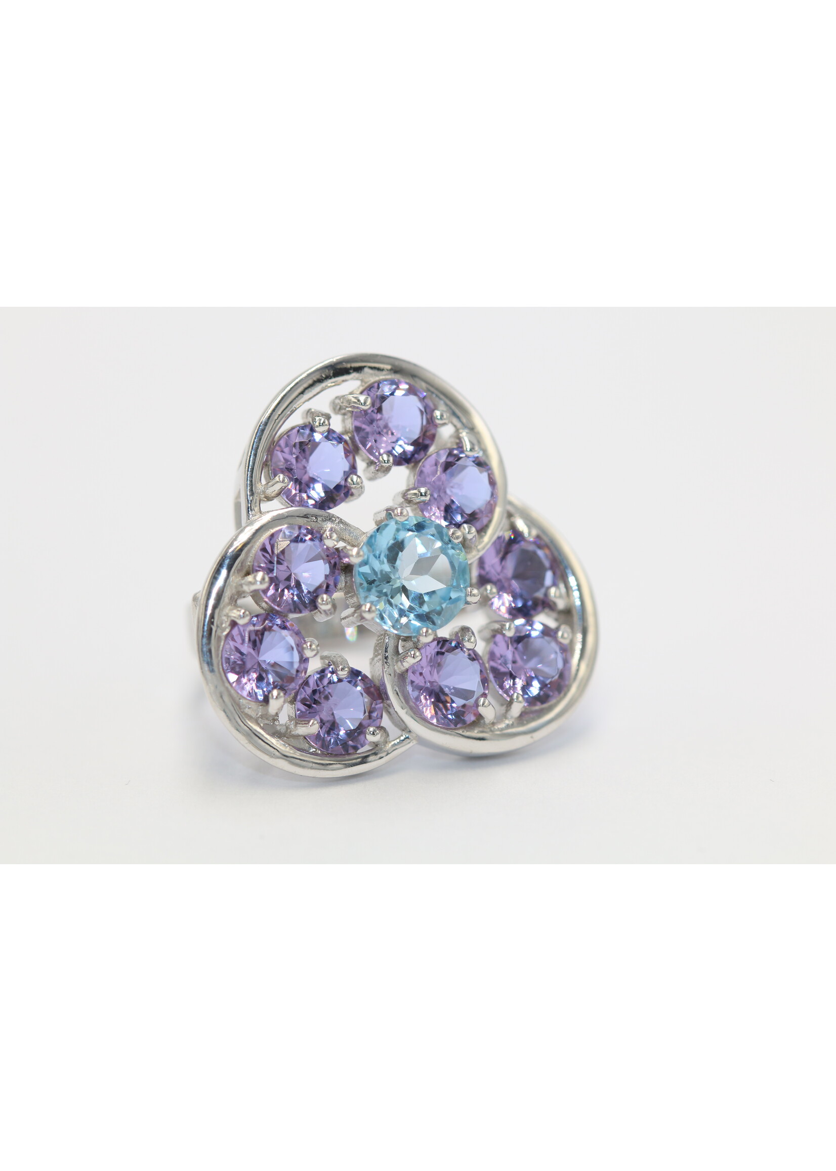 925 rhodium plated silver ring set with natural Blue Topaz and Amethysts