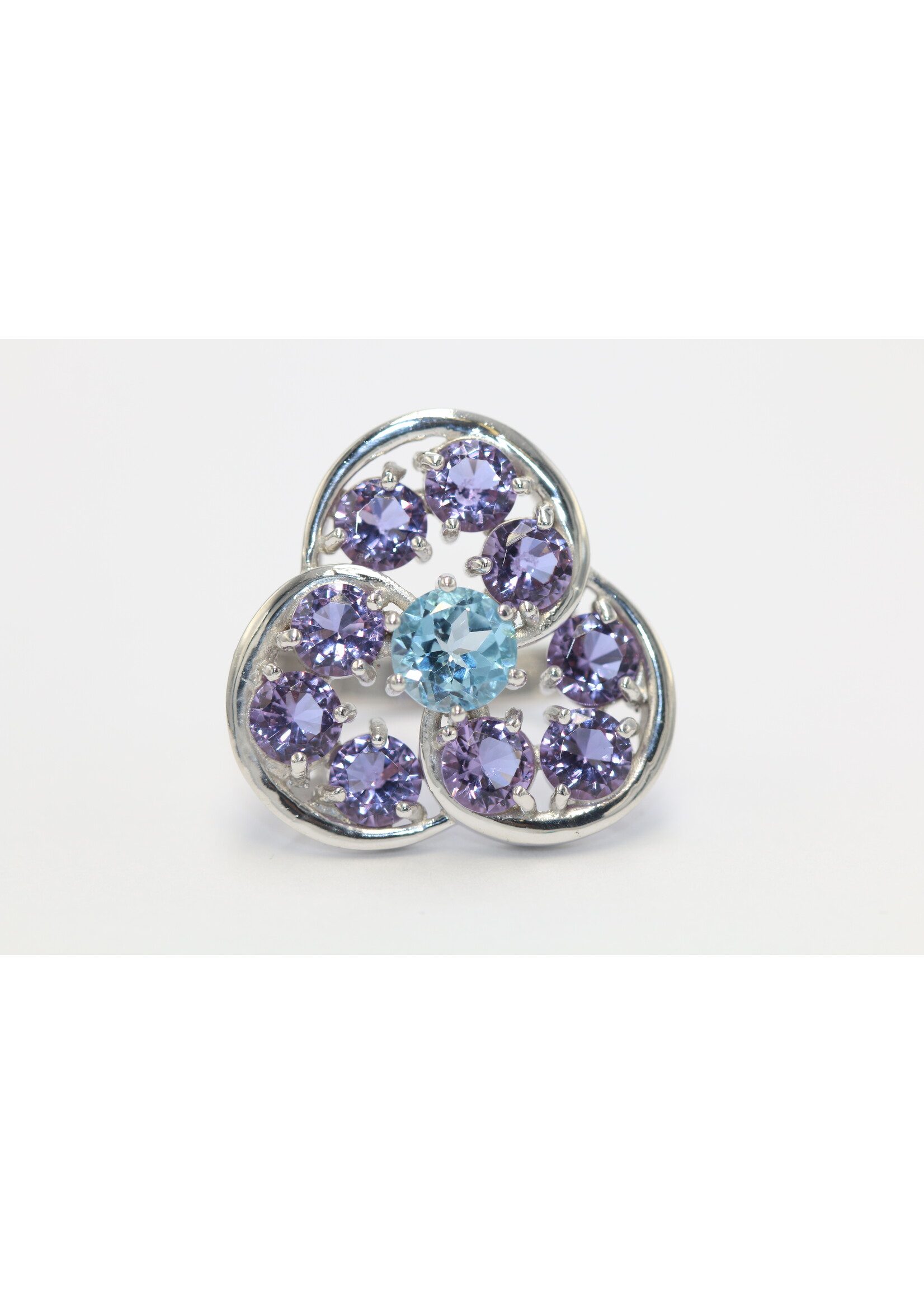 925 rhodium plated silver ring set with natural Blue Topaz and Amethysts
