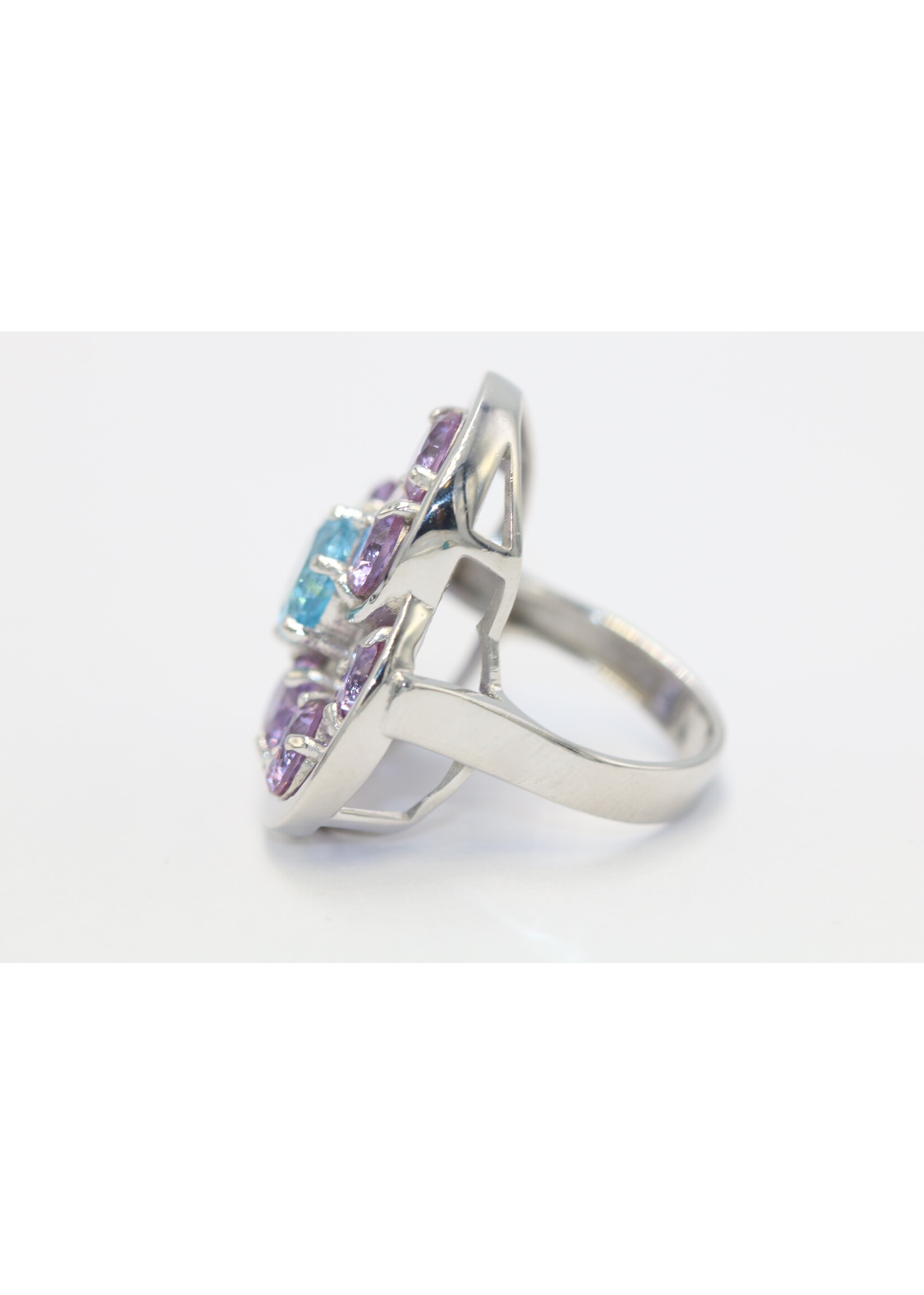 925 rhodium plated silver ring set with natural Blue Topaz and Amethysts