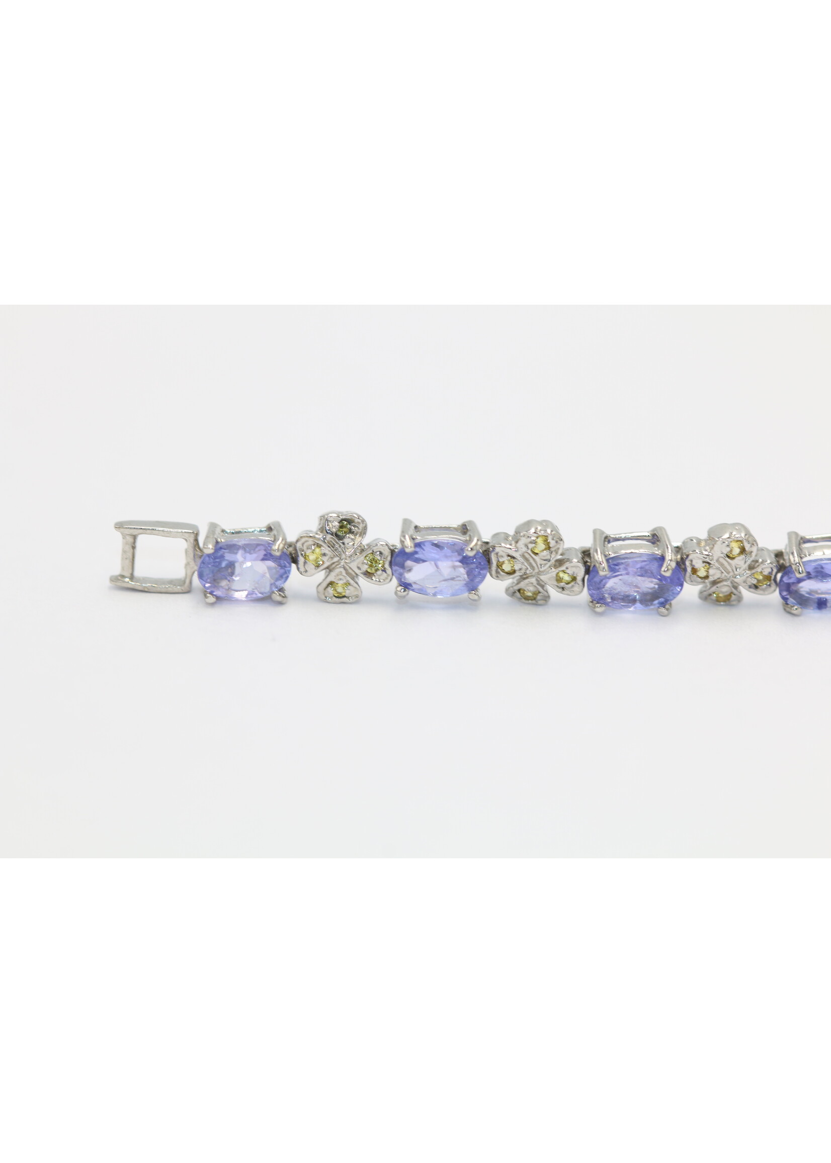 925 rhodium plated silver bracelet set with natural sapphire and tanzanite