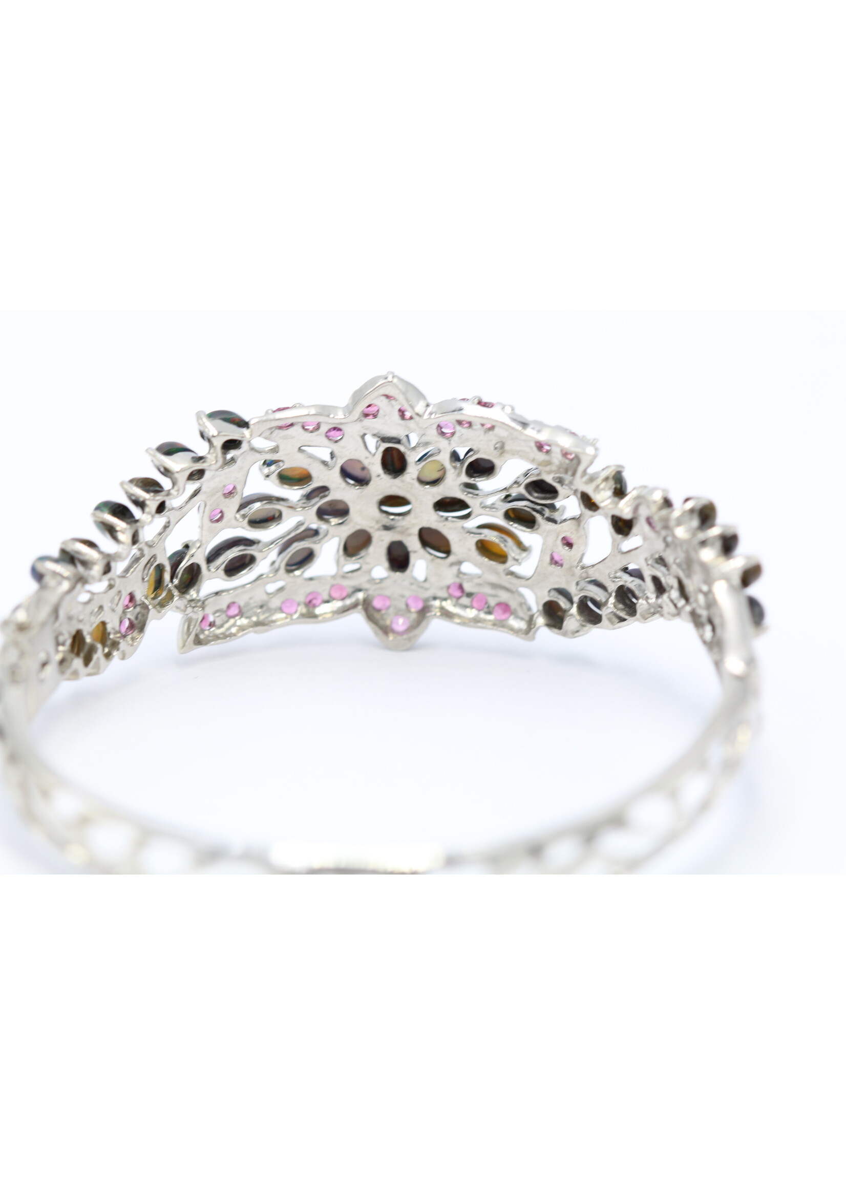 925 rhodium plated silver bracelet set with natural black opal and rhodolites