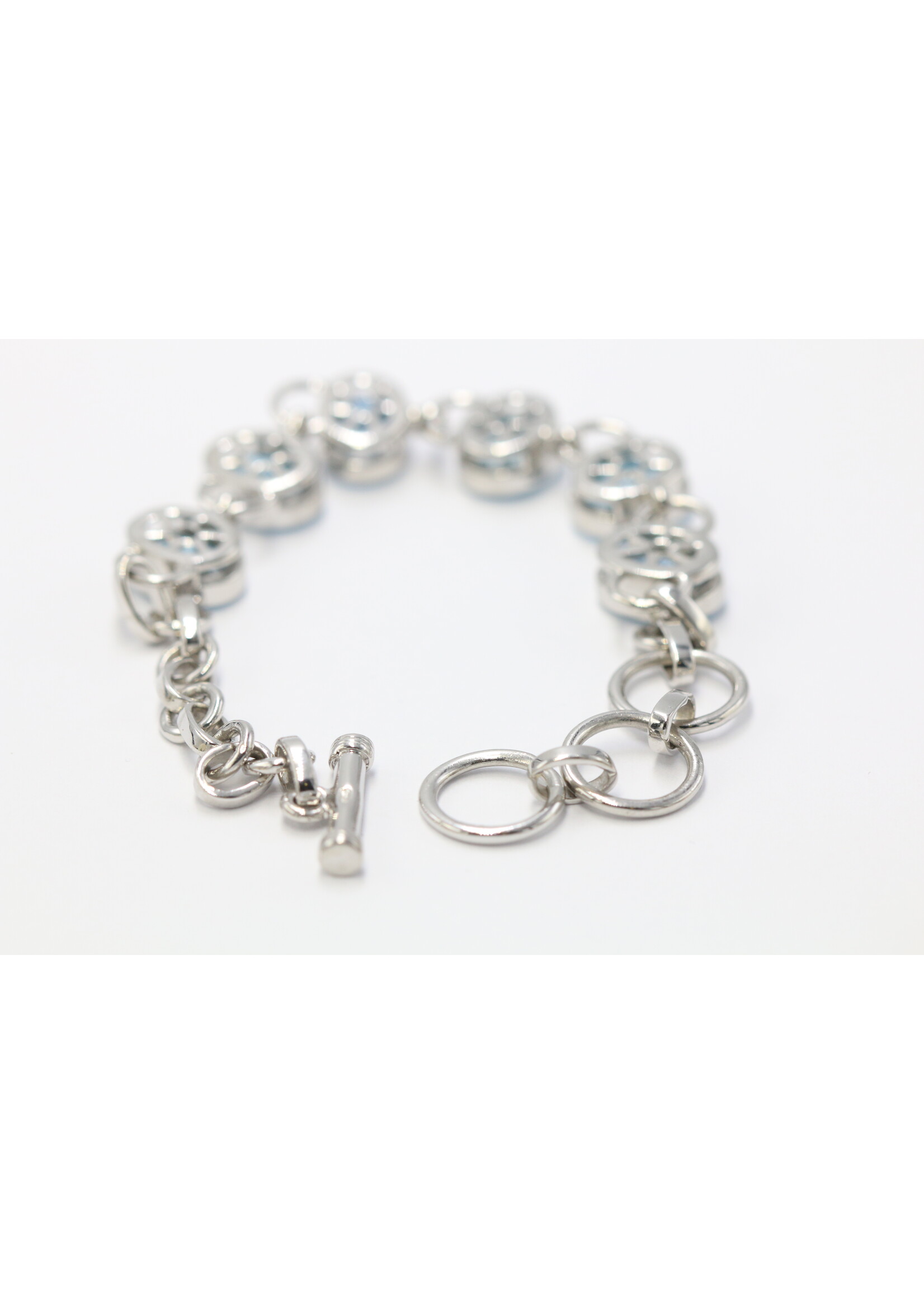 925 rhodium plated silver bracelet set with natural Blue Topaz