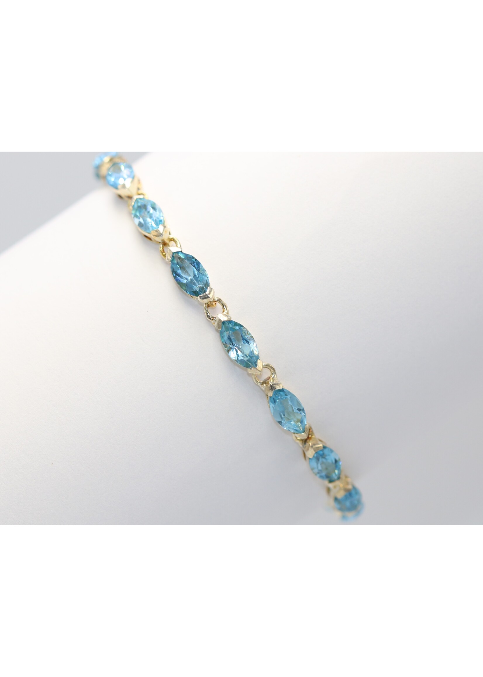 925 rhodium plated silver bracelet set with natural Blue Topaz