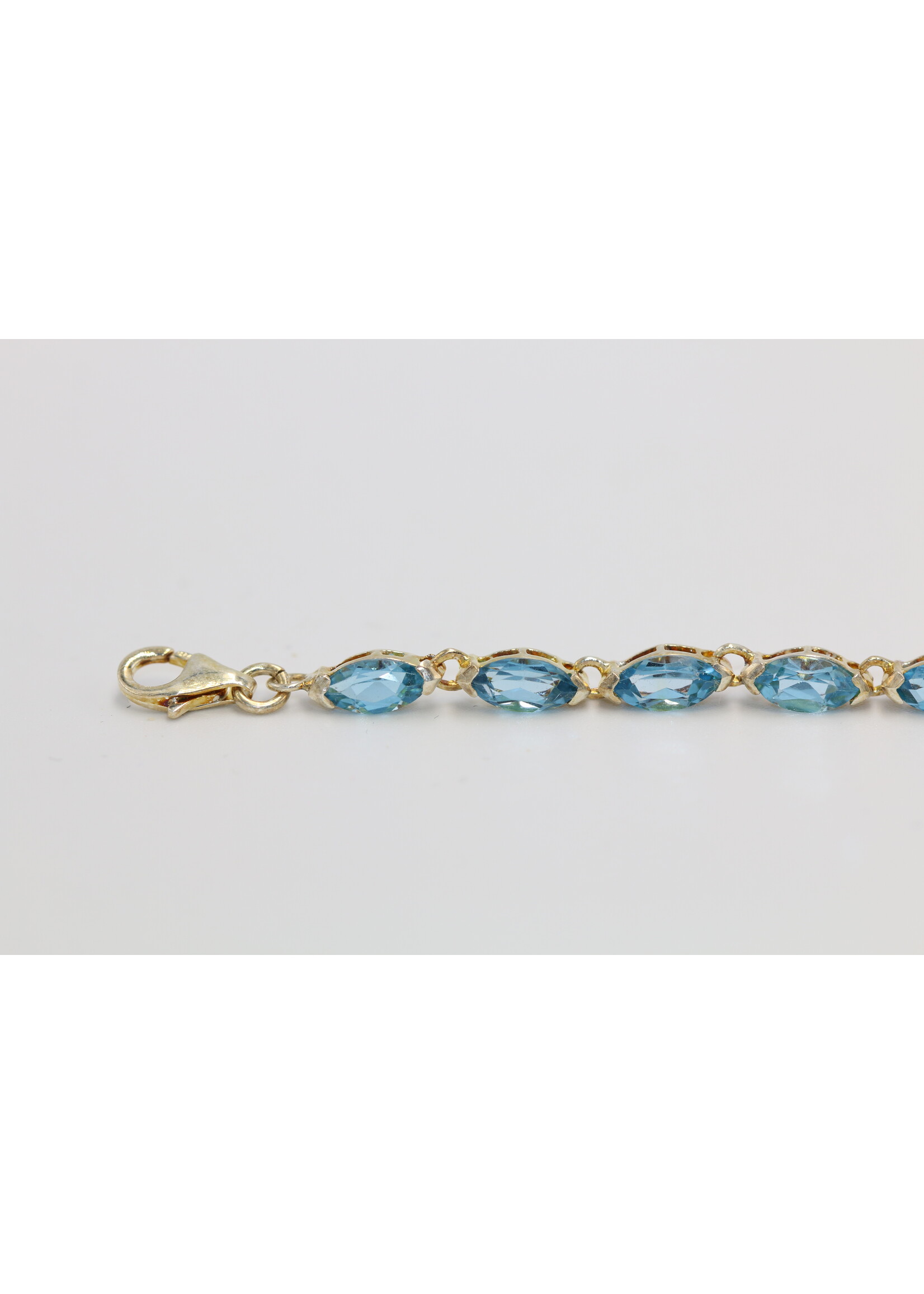 Bracelet en argent 925 rhodié serti de Topaze Bleue naturelle