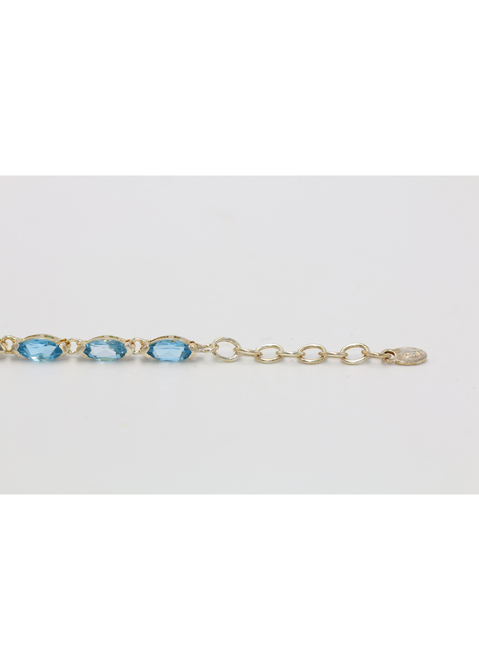 Bracelet en argent 925 rhodié serti de Topaze Bleue naturelle