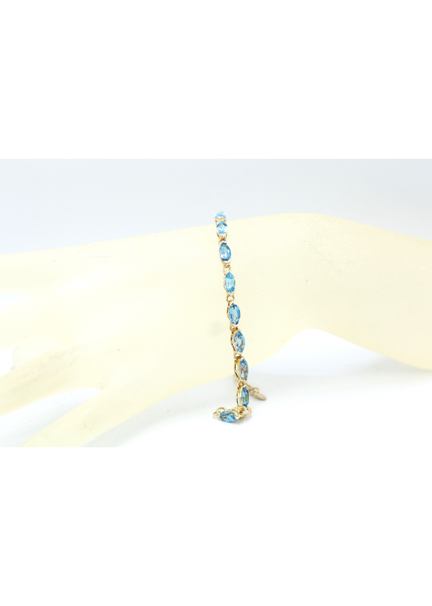 925 rhodium plated silver bracelet set with natural Blue Topaz