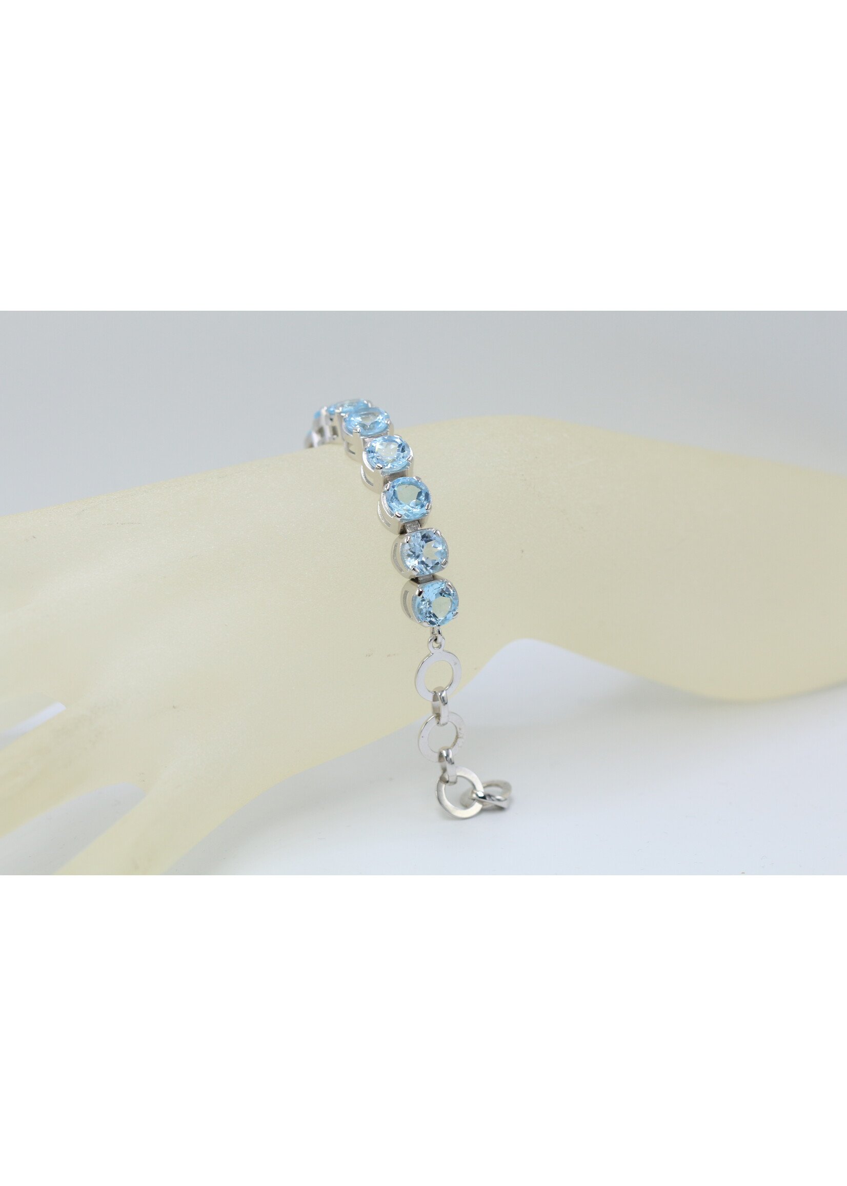 925 rhodium plated silver bracelet set with natural Blue Topaz