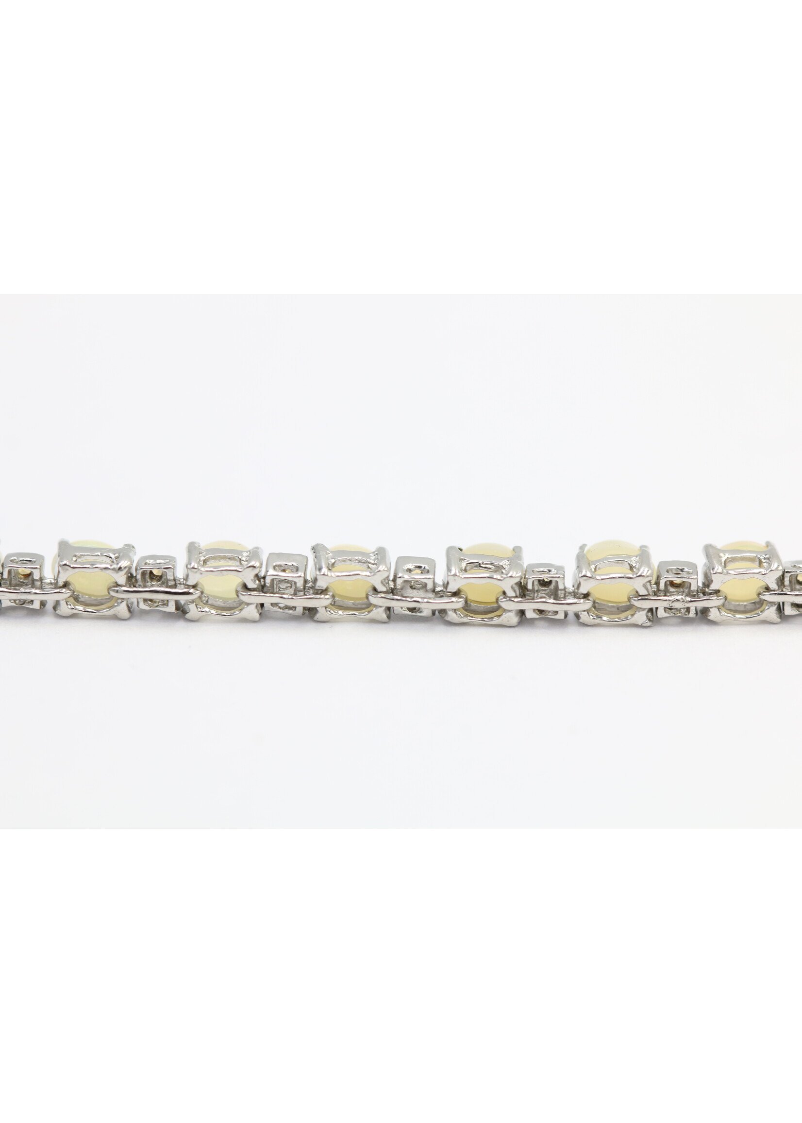 925 rhodium plated silver bracelet set with natural sapphire and opal