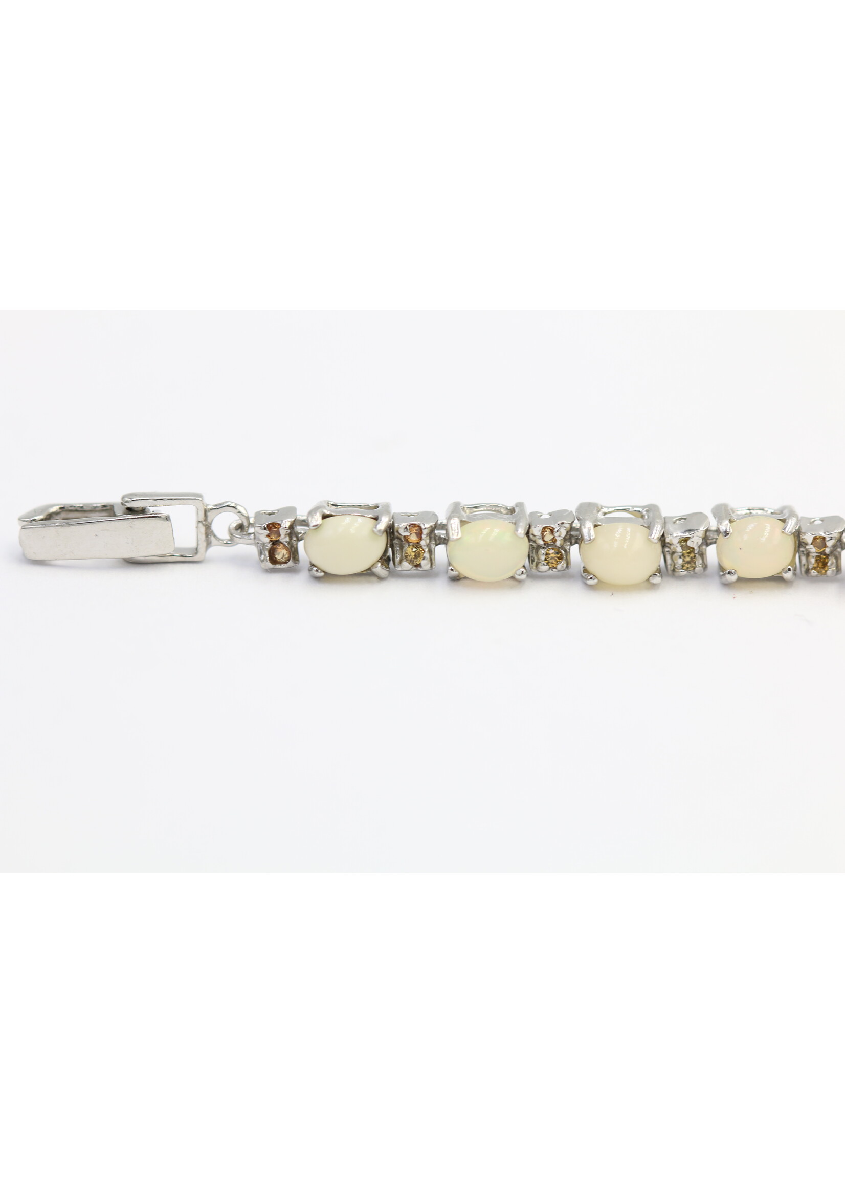 925 rhodium plated silver bracelet set with natural sapphire and opal
