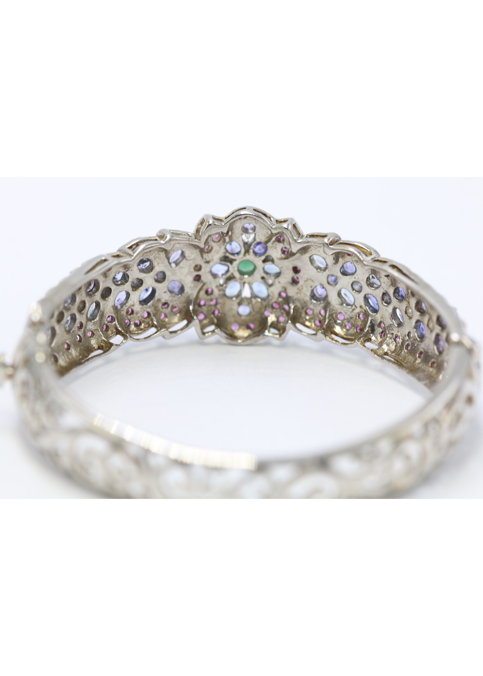 925 rhodium plated silver bracelet set with natural emerald, rhodolite and tanzanite