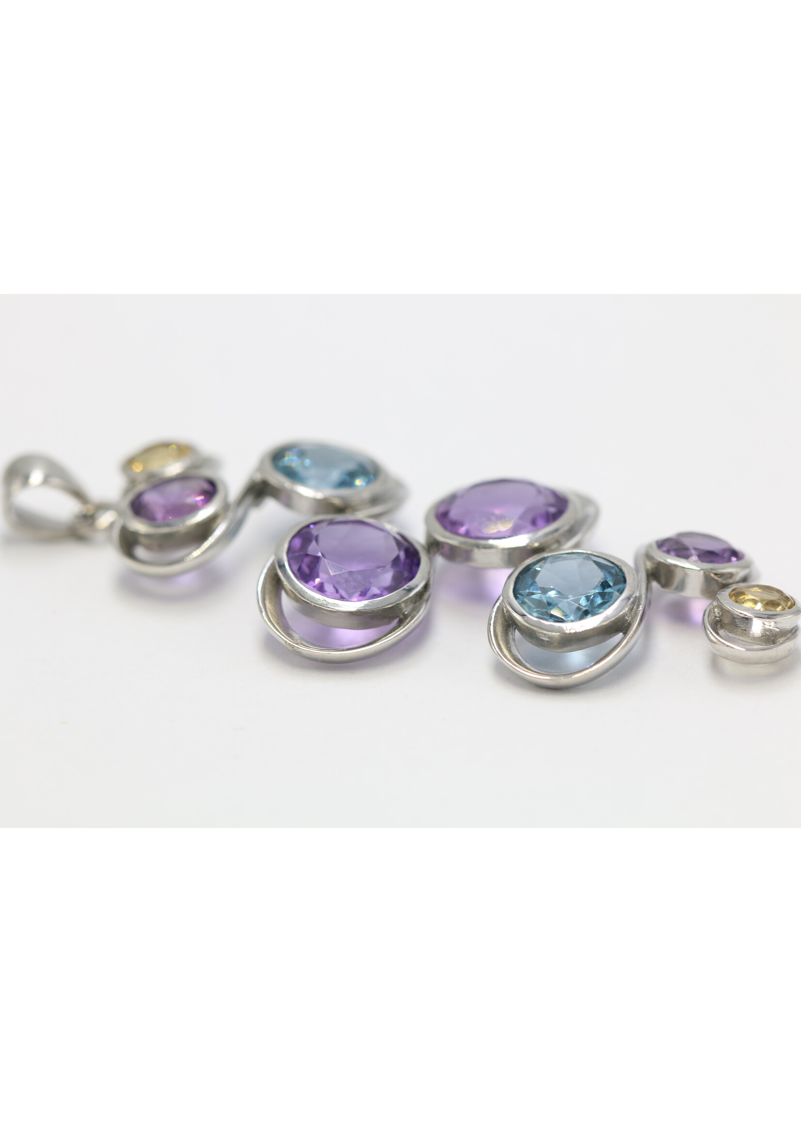 925 rhodium plated silver pendant set with natural Citrine, Topaz and Amethysts