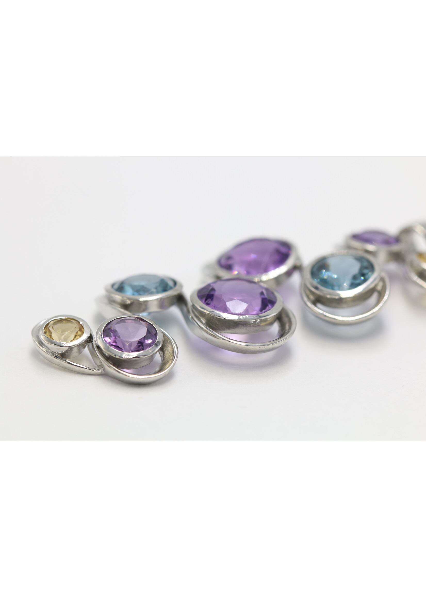 925 rhodium plated silver pendant set with natural Citrine, Topaz and Amethysts