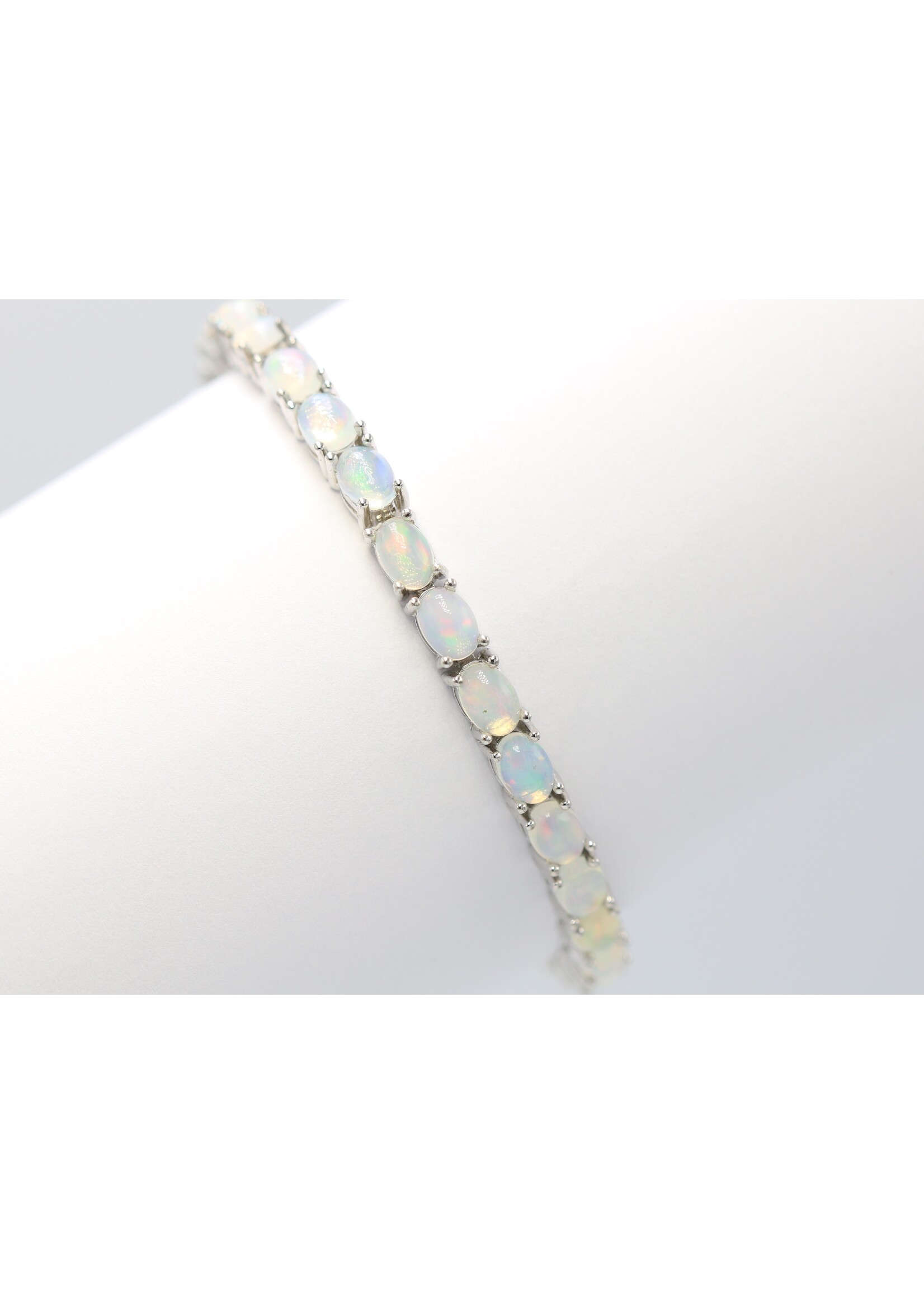 925 rhodium plated silver bracelet set with natural opals
