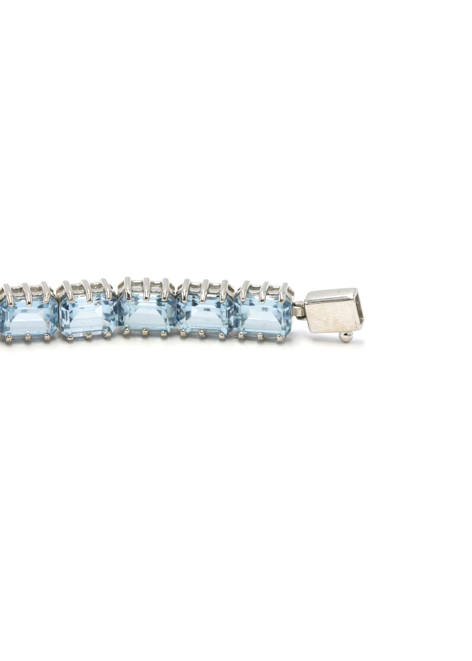 925 rhodium plated silver bracelet set with natural Blue Topaz