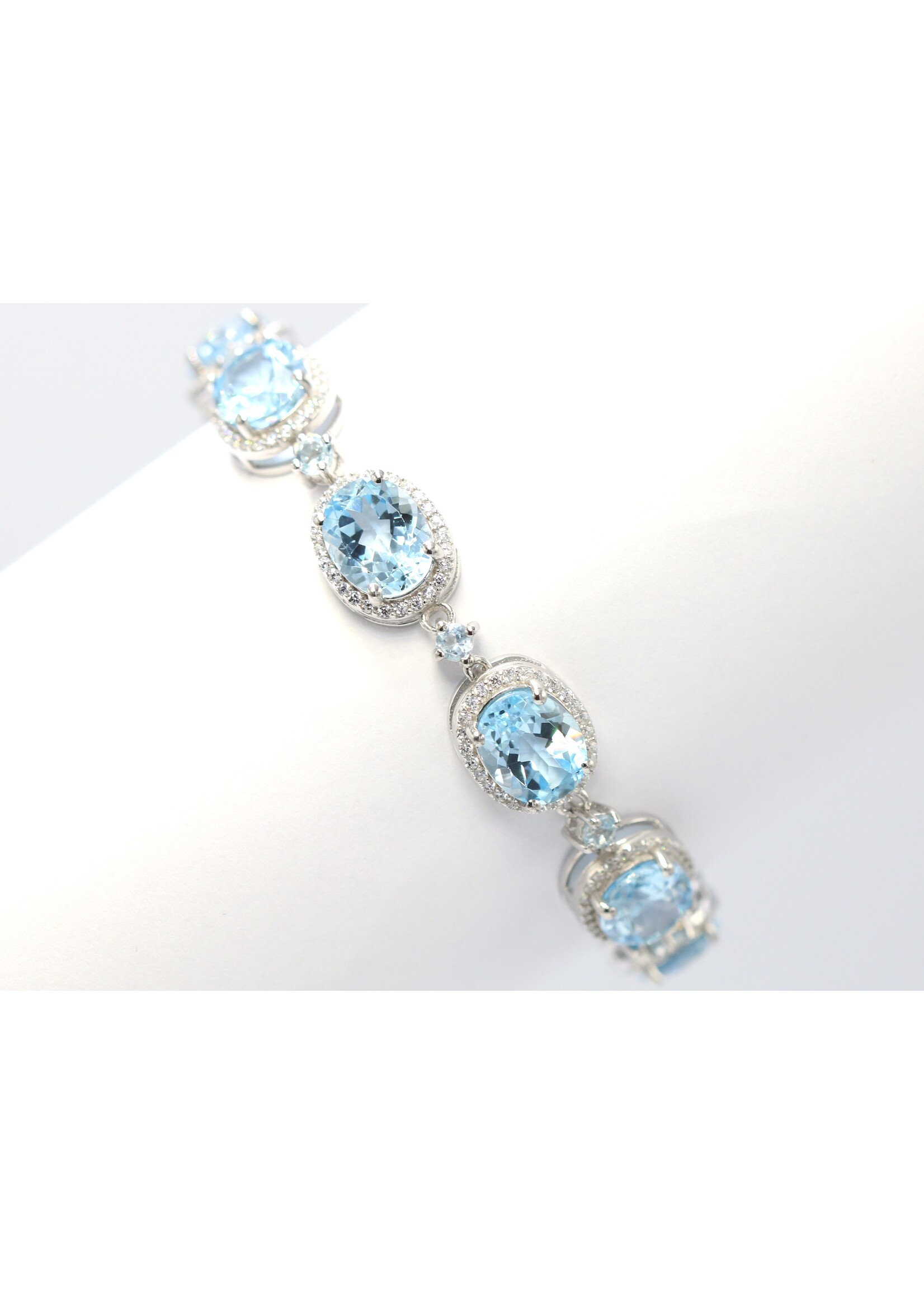 925 rhodium plated silver bracelet set with natural Blue Topaz