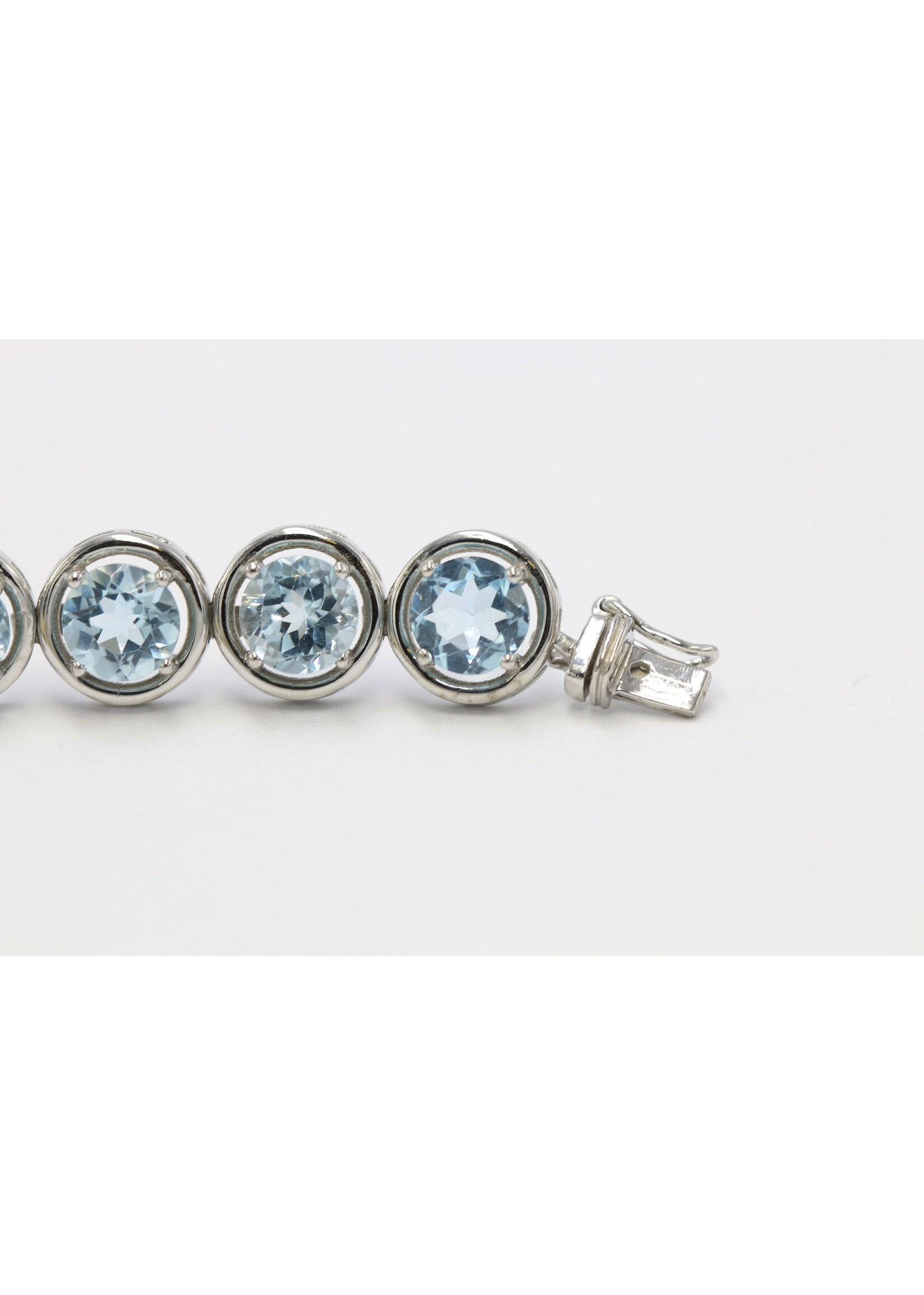 925 rhodium plated silver bracelet set with natural Blue Topaz - Copy - Copy
