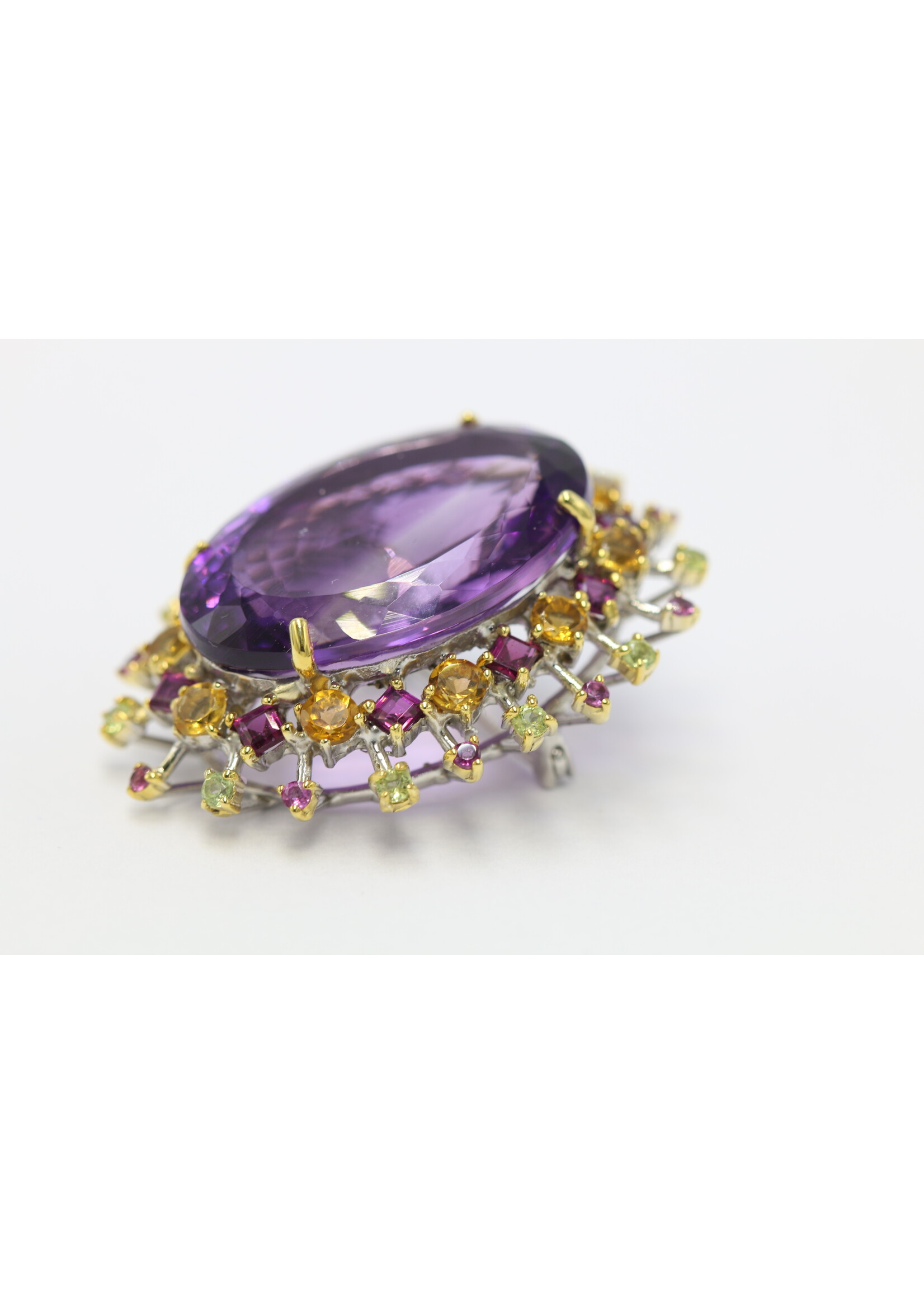 925 rhodium plated silver brooch set with natural amethyst, peridots, rhodolite and citrines