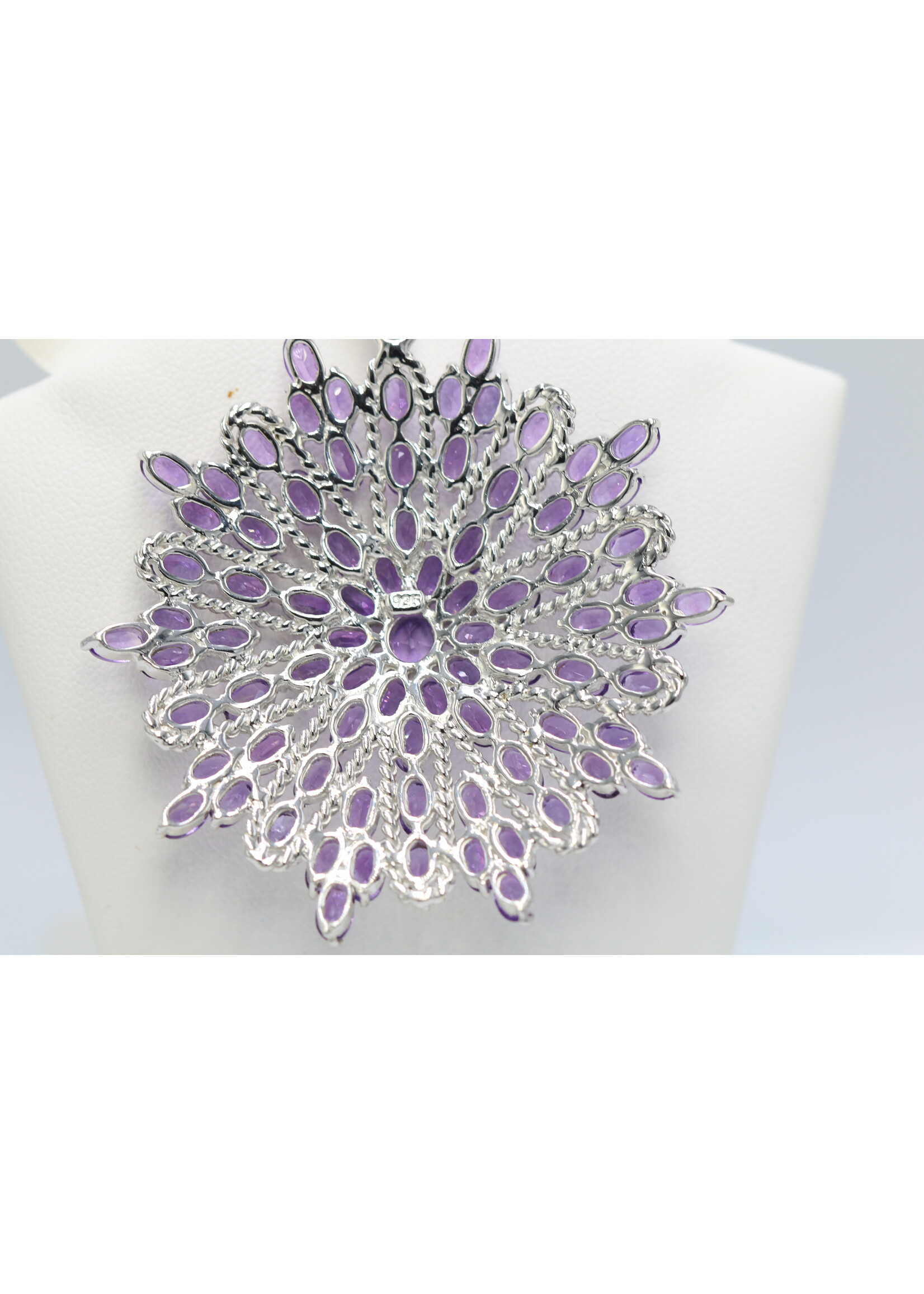 925 rhodium plated silver pendant set with natural amethysts