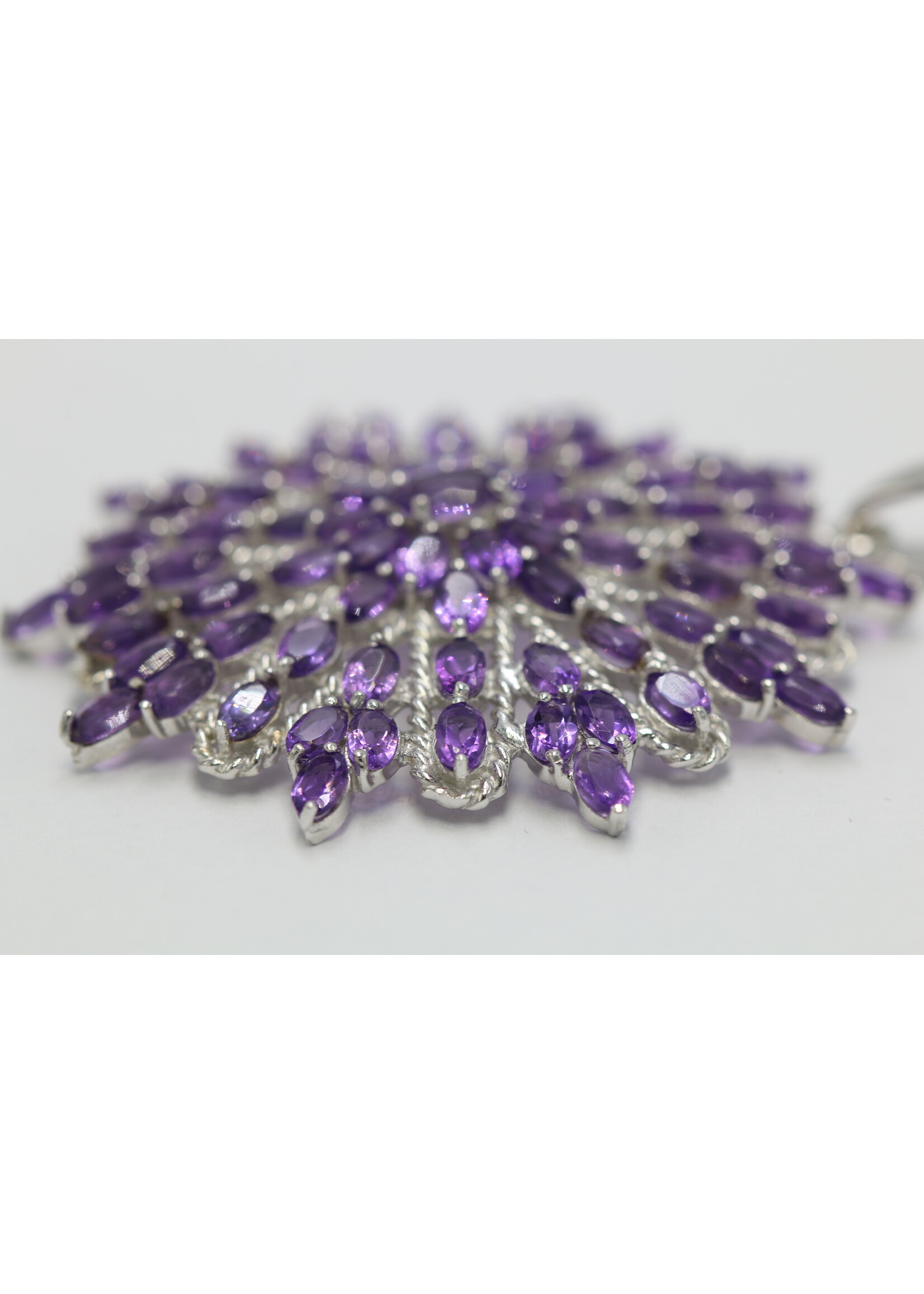 925 rhodium plated silver pendant set with natural amethysts