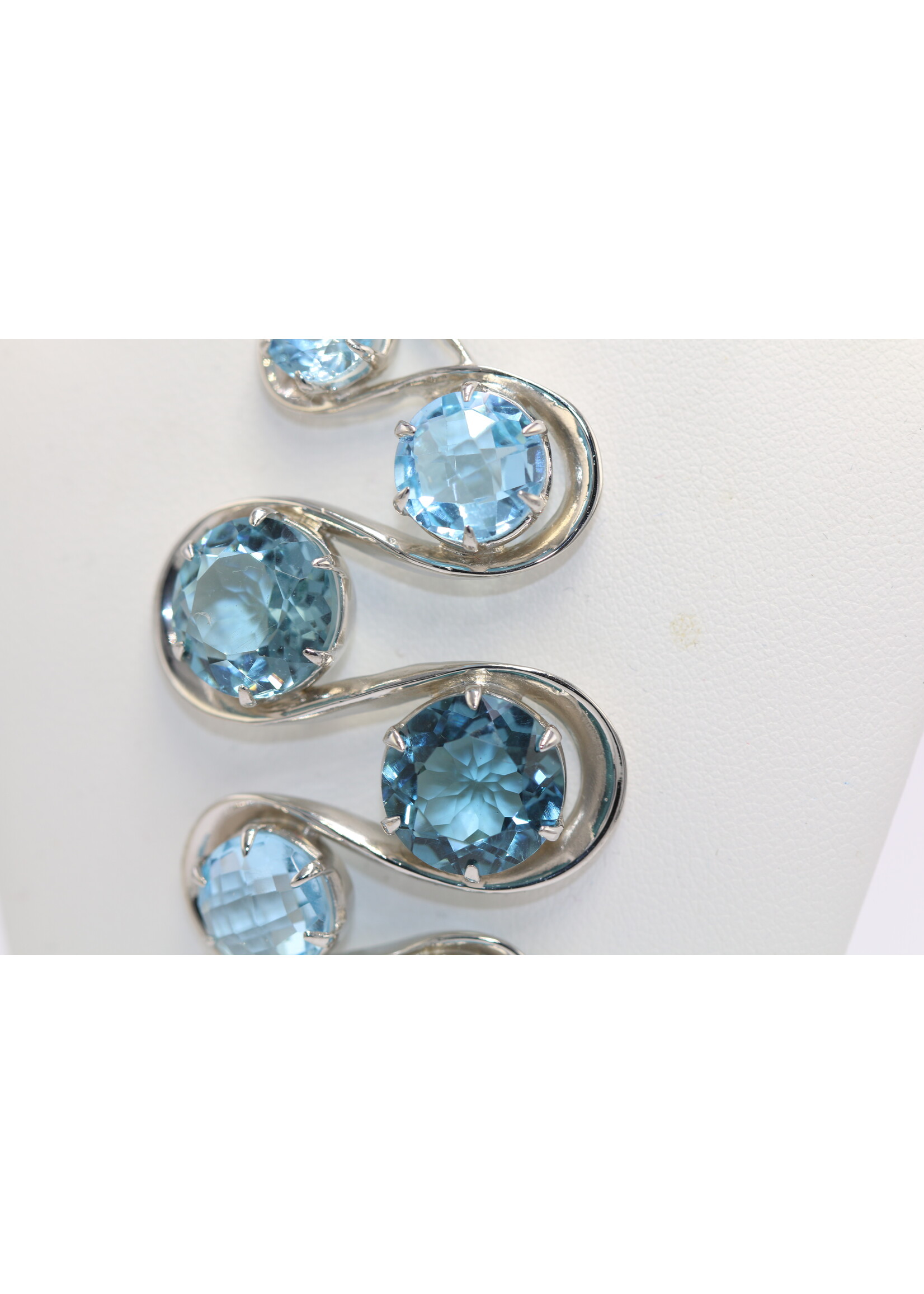 925 rhodium plated silver pendant set with natural topazes