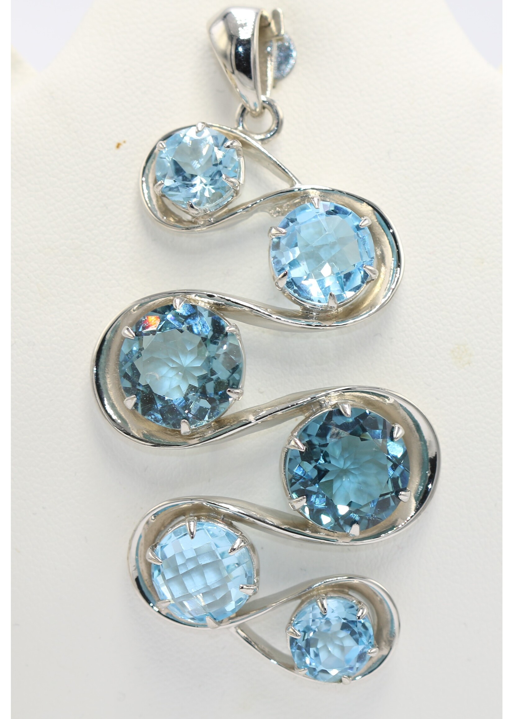 925 rhodium plated silver pendant set with natural topazes