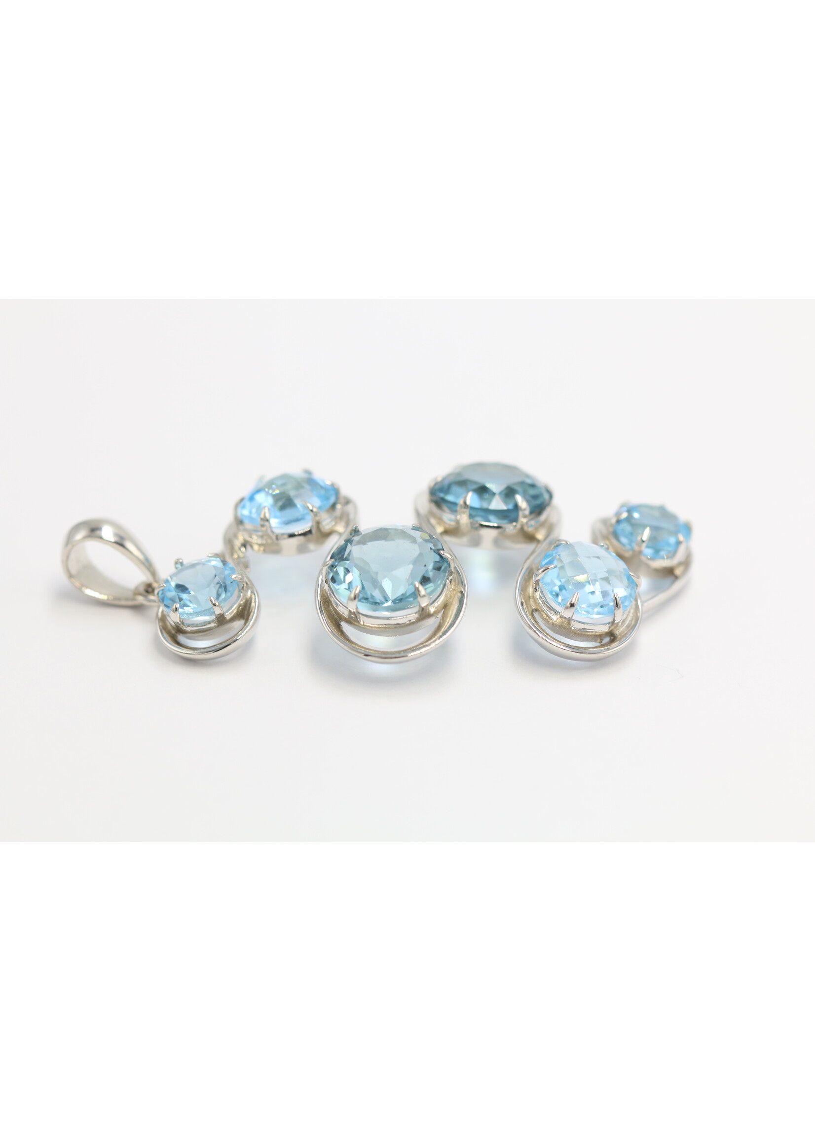 925 rhodium plated silver pendant set with natural topazes